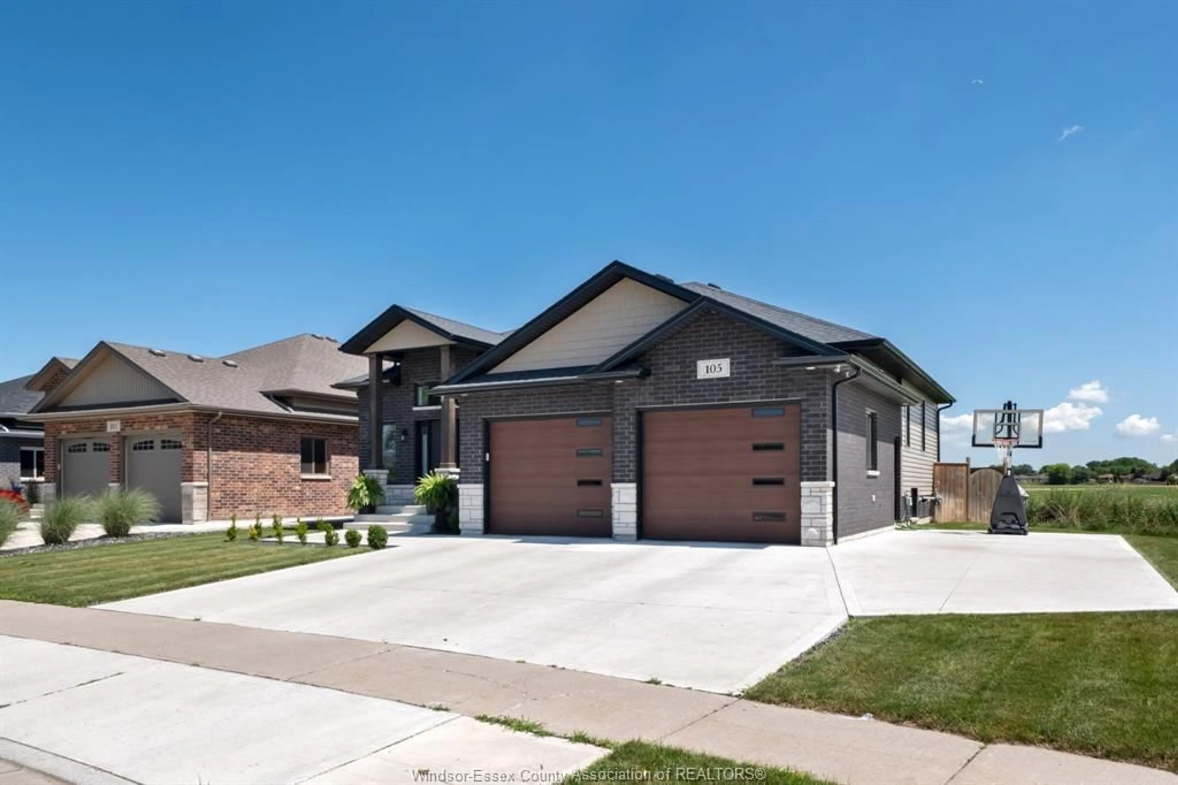 Home with brick exterior material, street for 105 CONSERVATION Blvd, Kingsville Ontario N9V 0E4