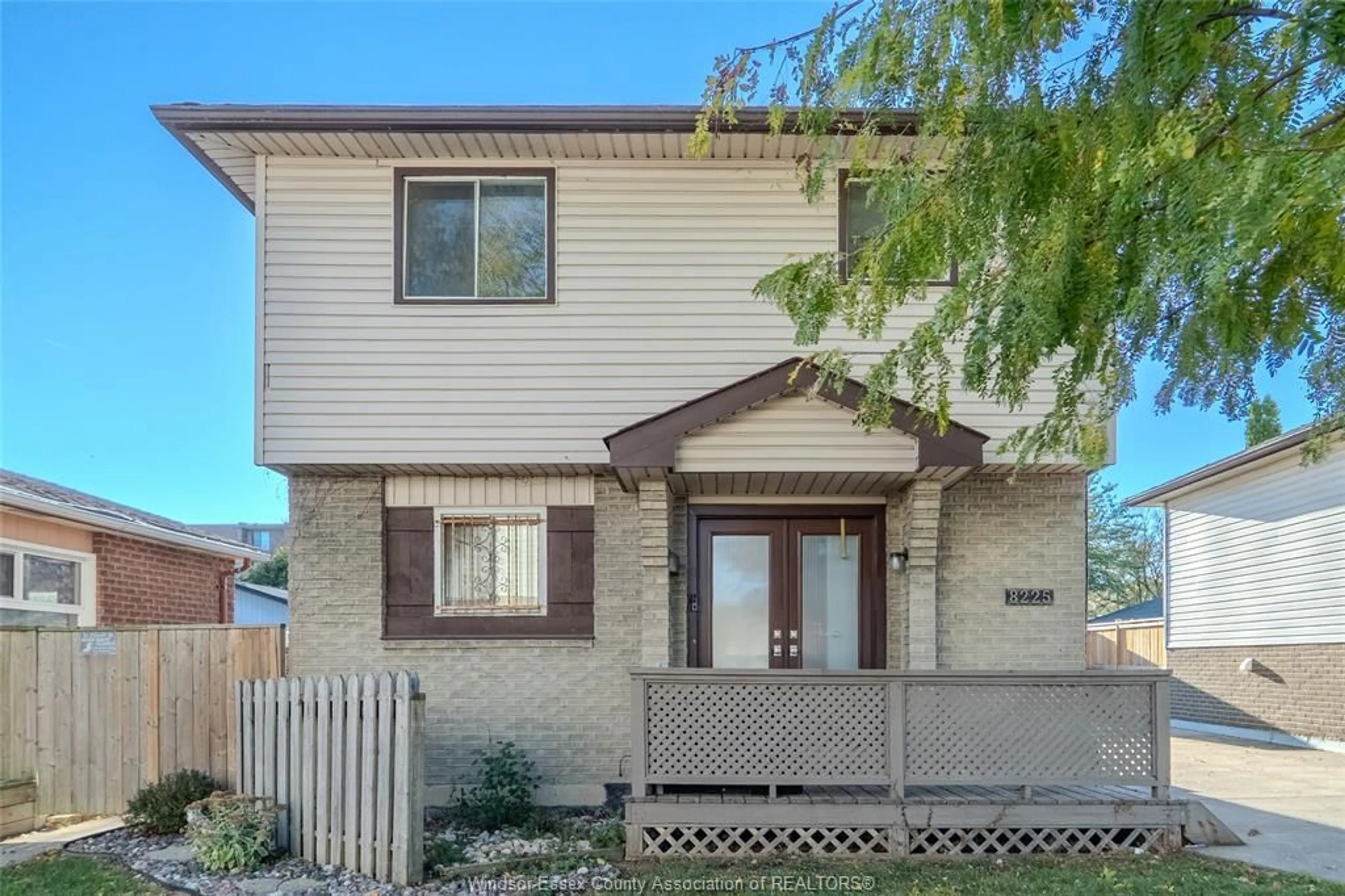 Home with brick exterior material, street for 8225 Gateside Pl, Windsor Ontario N8S 4N7