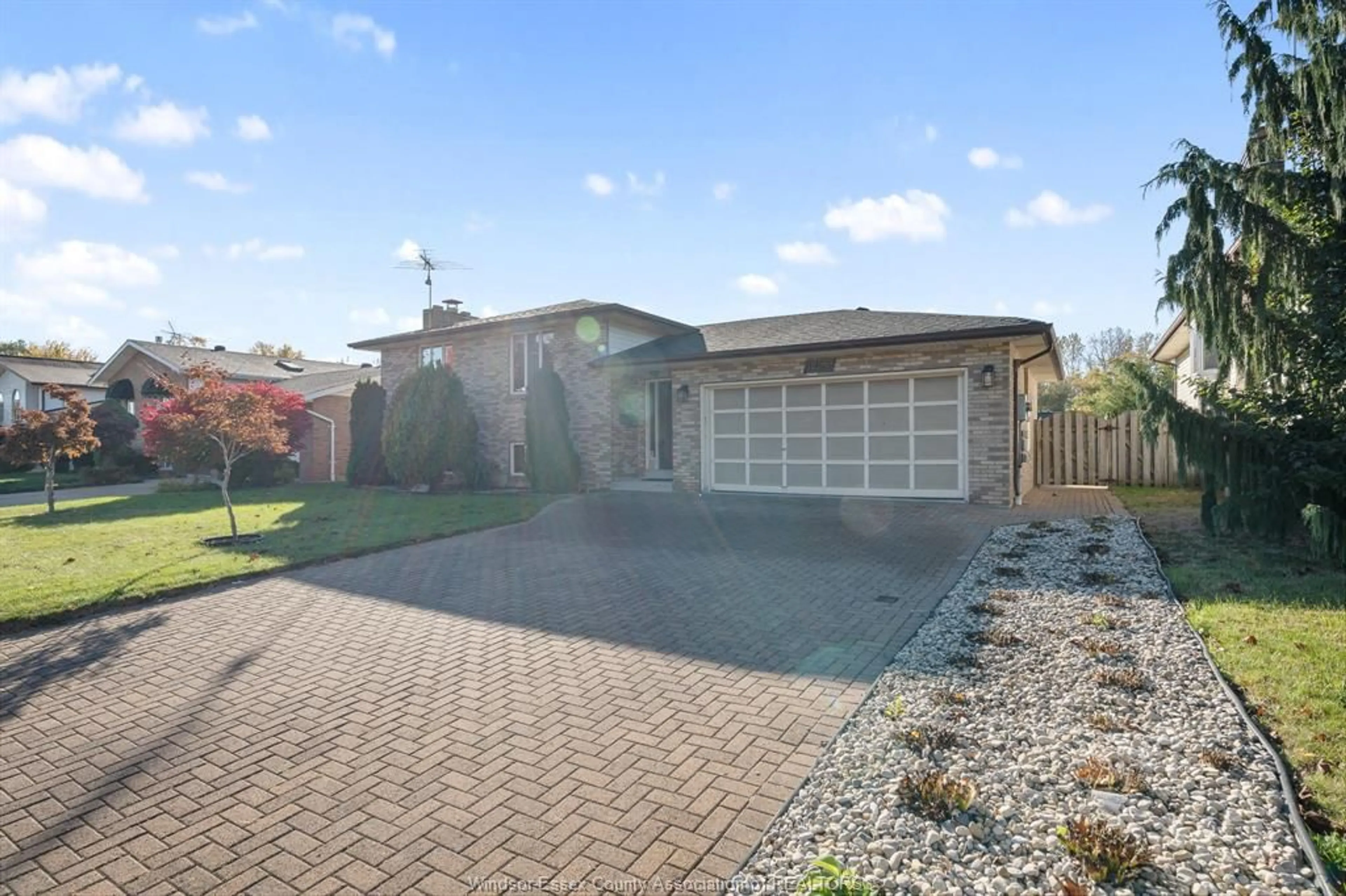 A pic from outside/outdoor area/front of a property/back of a property/a pic from drone, street for 1953 Edgemore Ave, LaSalle Ontario N9H 2J6