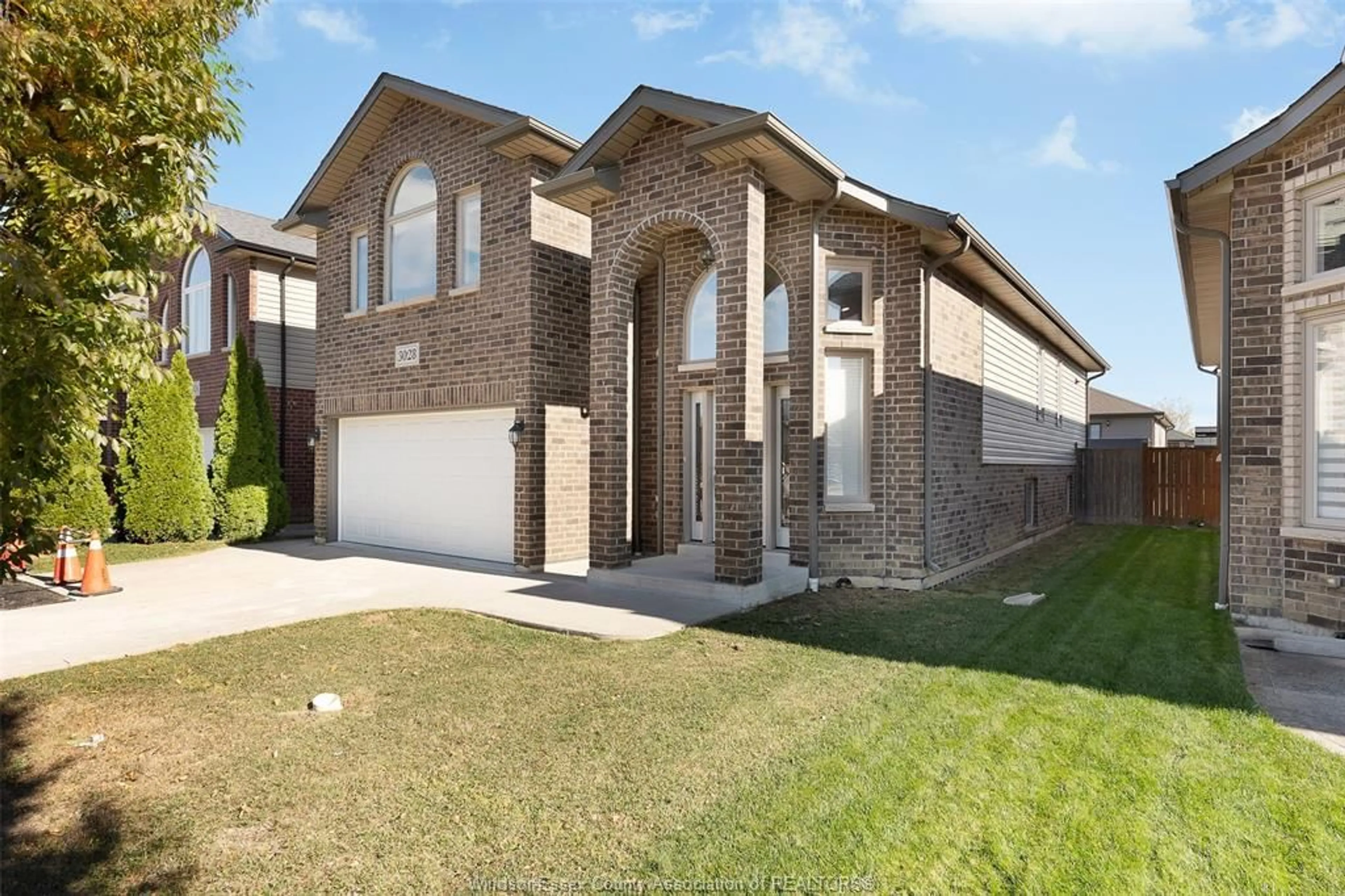 Home with brick exterior material, street for 3028 MCROBBIE Cres, Windsor Ontario N8R 0A5