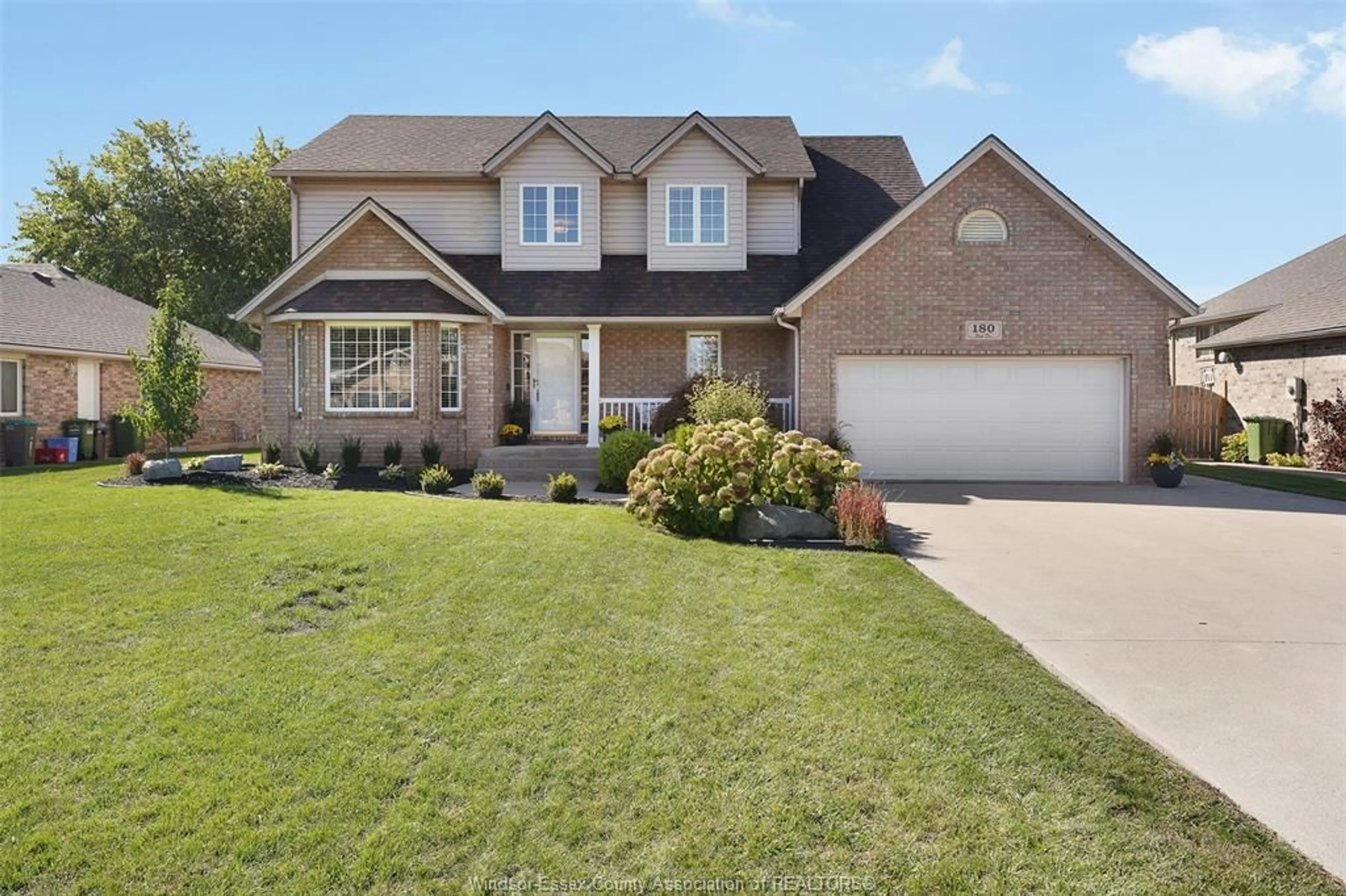 Home with brick exterior material, street for 180 OAK DRIVE, Essex Ontario N8M 3C6