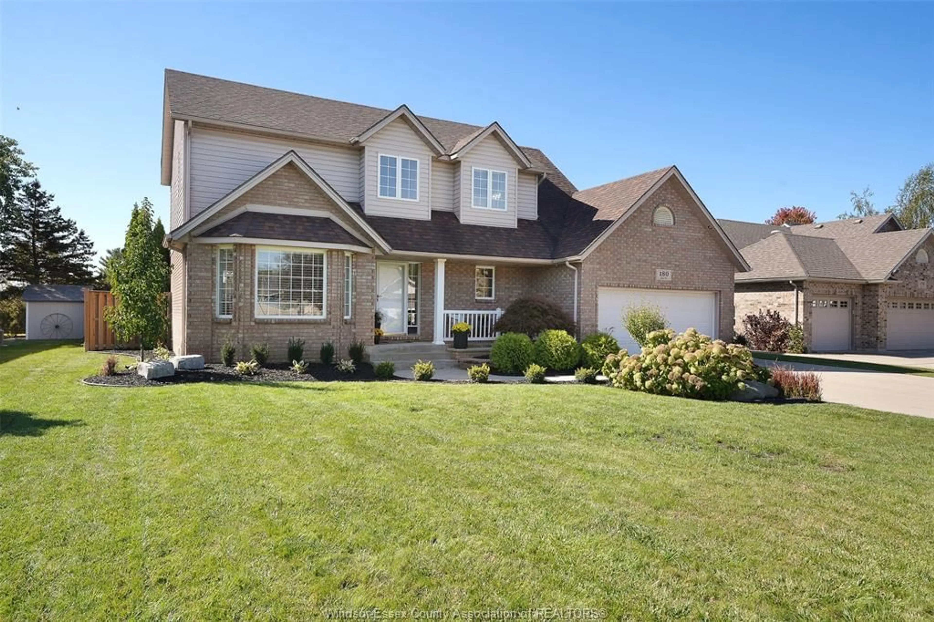 Home with brick exterior material, street for 180 OAK DRIVE, Essex Ontario N8M 3C6