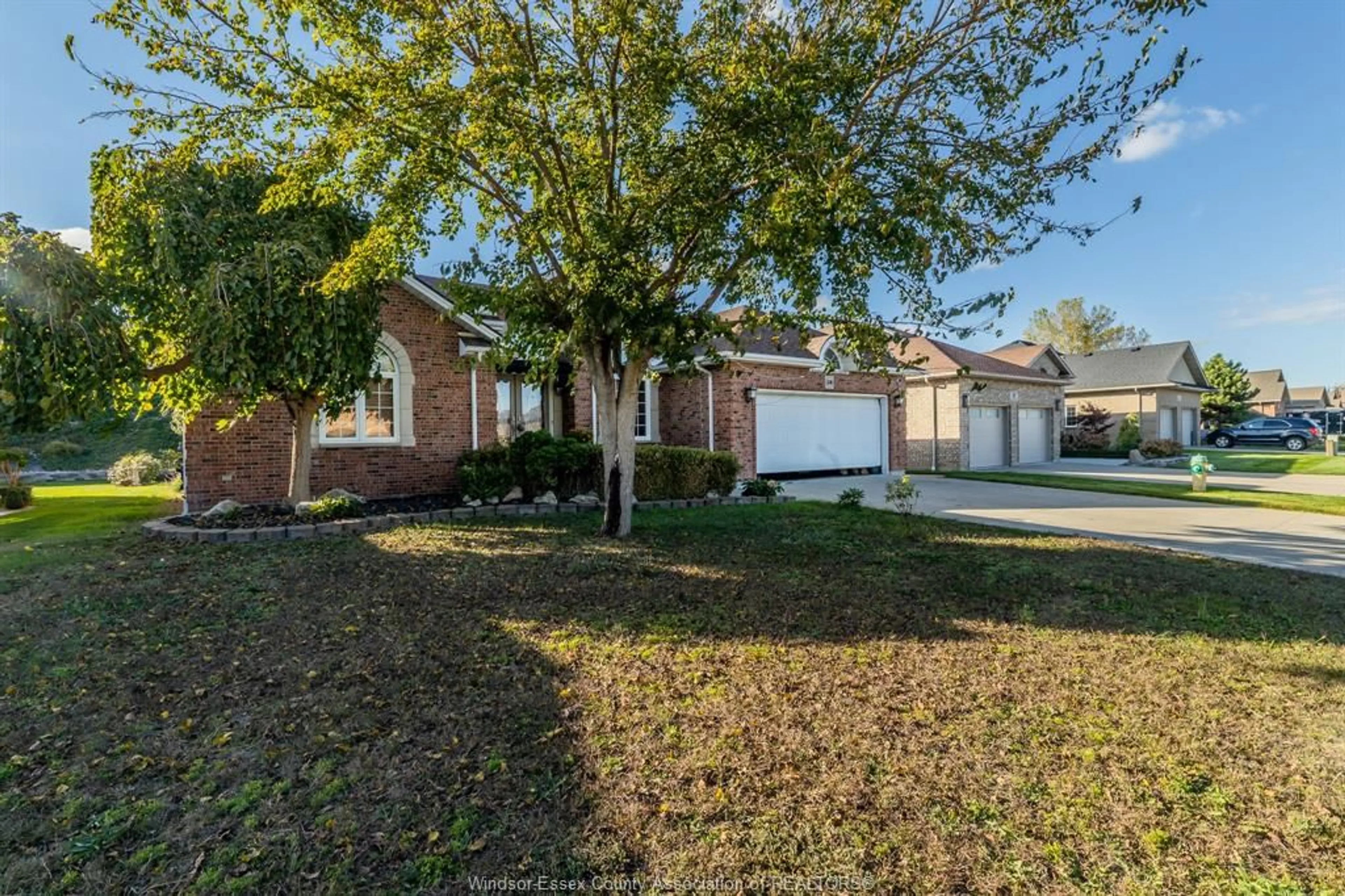 A pic from outside/outdoor area/front of a property/back of a property/a pic from drone, street for 59 SANDY LAKE Dr, Leamington Ontario N8M 5K4