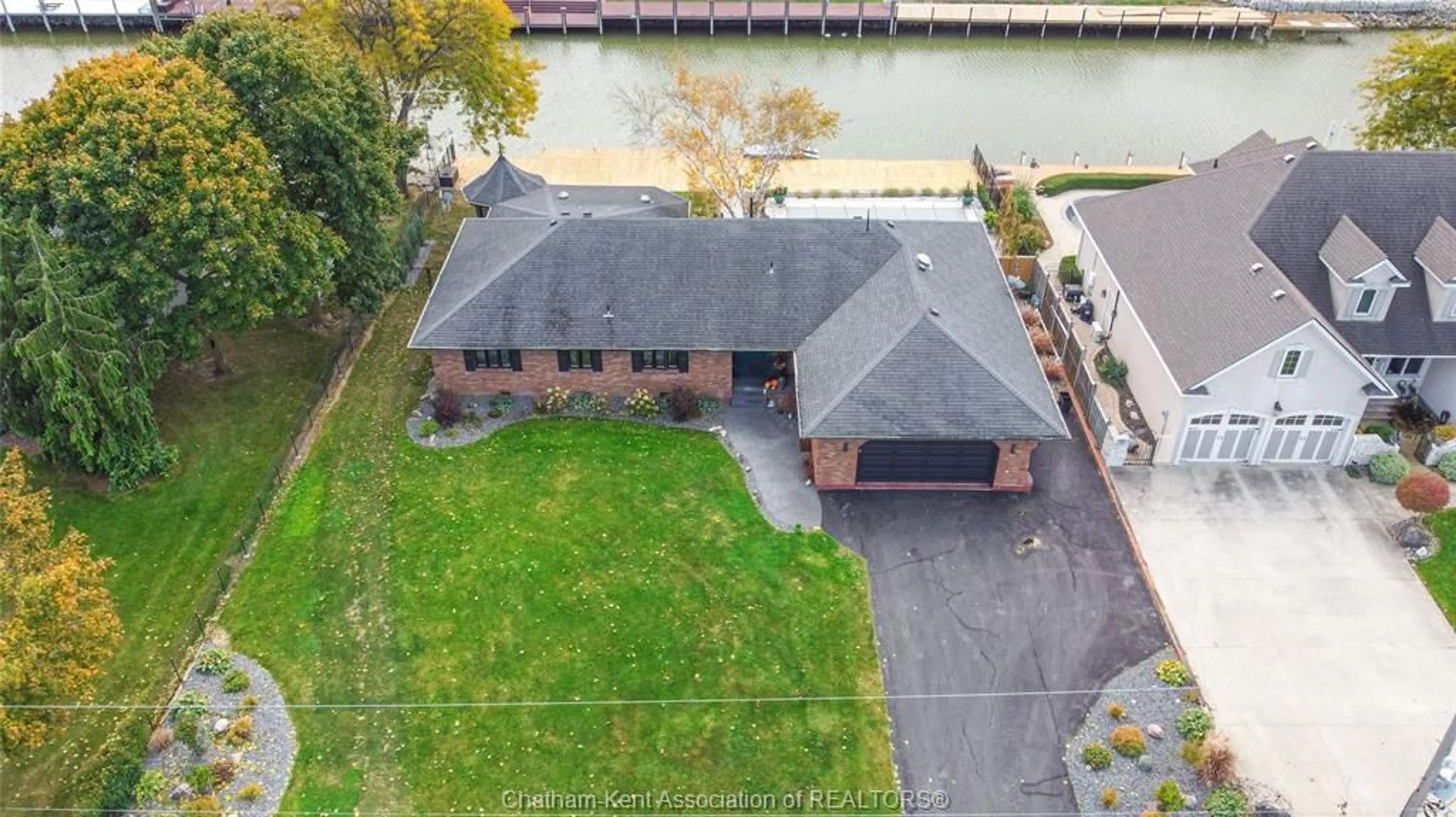 A pic from outside/outdoor area/front of a property/back of a property/a pic from drone, water/lake/river/ocean view for 19165 BLUE WATER Ave, Lighthouse Cove Ontario N0P 2L0