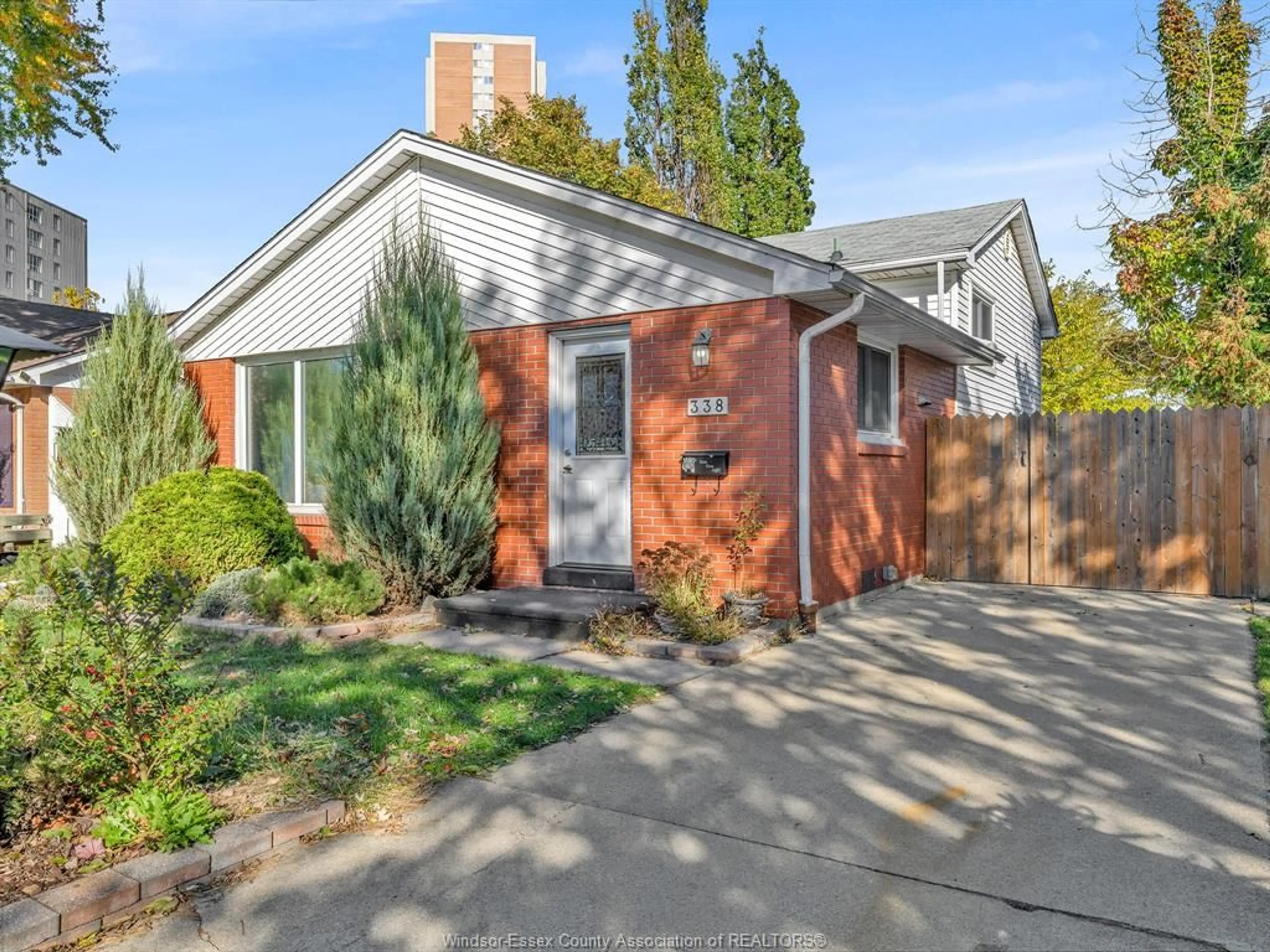 Home with brick exterior material, street for 338 CARLING Cres, Windsor Ontario N8S 3X8