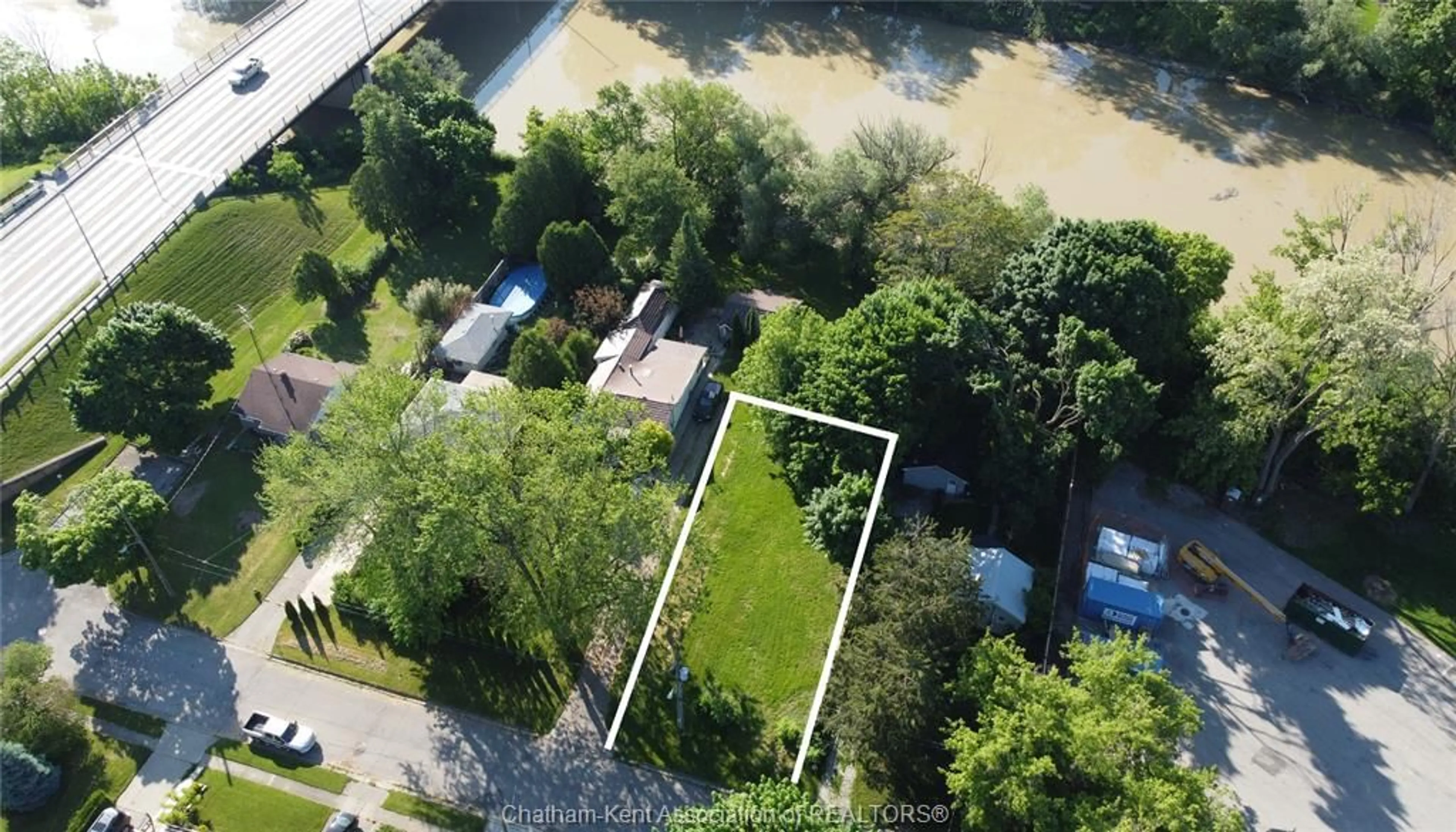 A pic from outside/outdoor area/front of a property/back of a property/a pic from drone, water/lake/river/ocean view for 12 Siskind Crt, Chatham Ontario N7L 5A1