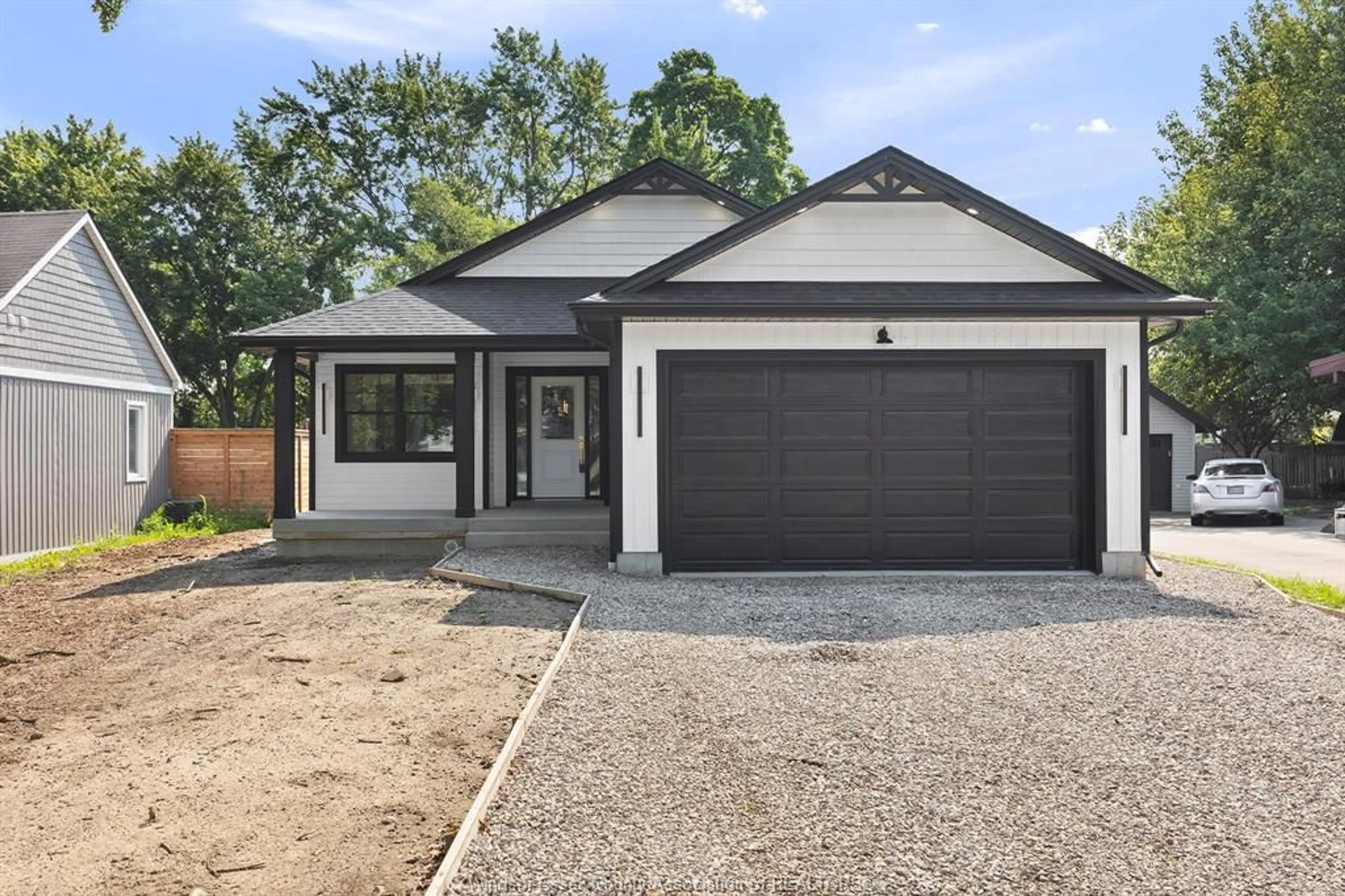 Home with brick exterior material, street for 256 EAST PUCE Rd, Lakeshore Ontario N8L 0C4