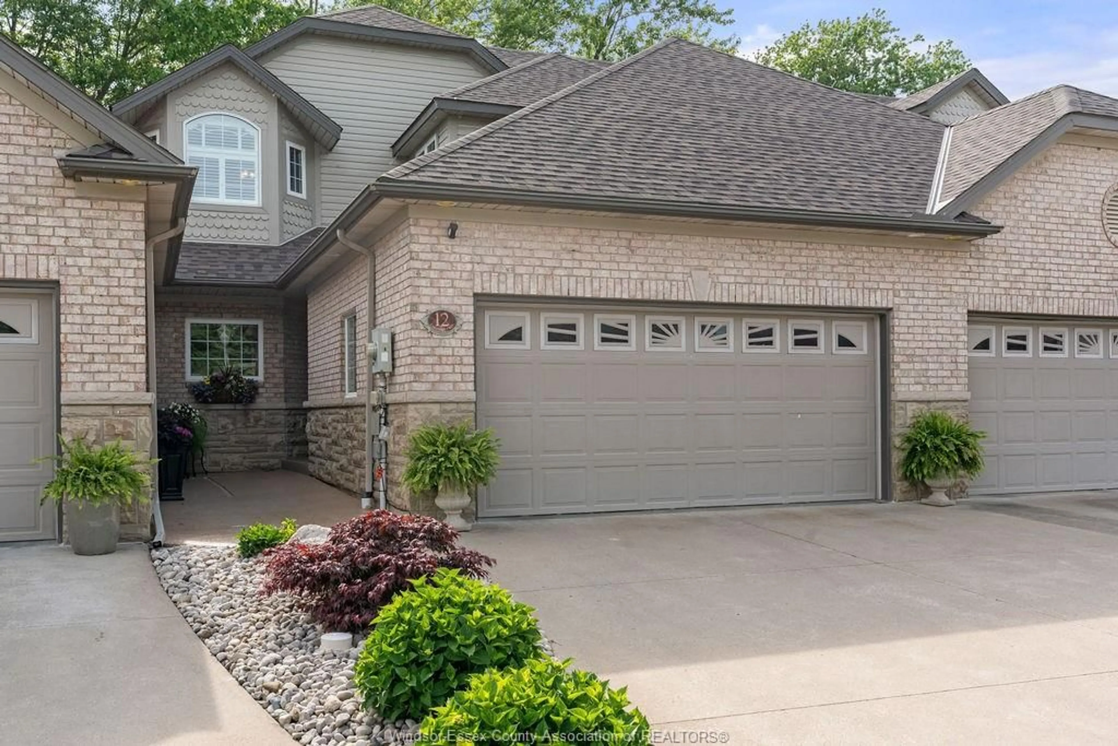 Home with brick exterior material, street for 12 LAKESIDE Cres, Kingsville Ontario N9Y 4C1