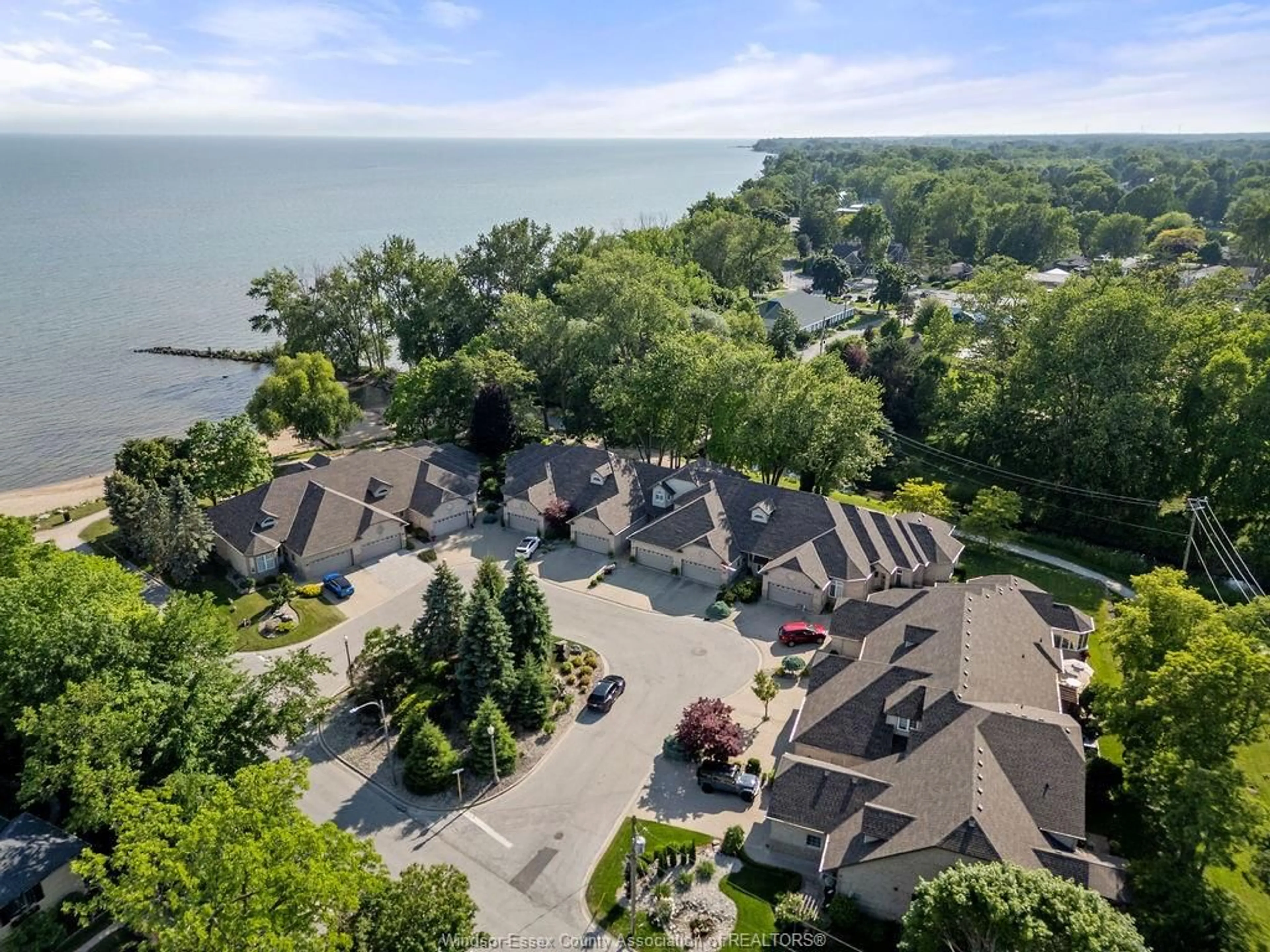 A pic from outside/outdoor area/front of a property/back of a property/a pic from drone, water/lake/river/ocean view for 12 LAKESIDE Cres, Kingsville Ontario N9Y 4C1