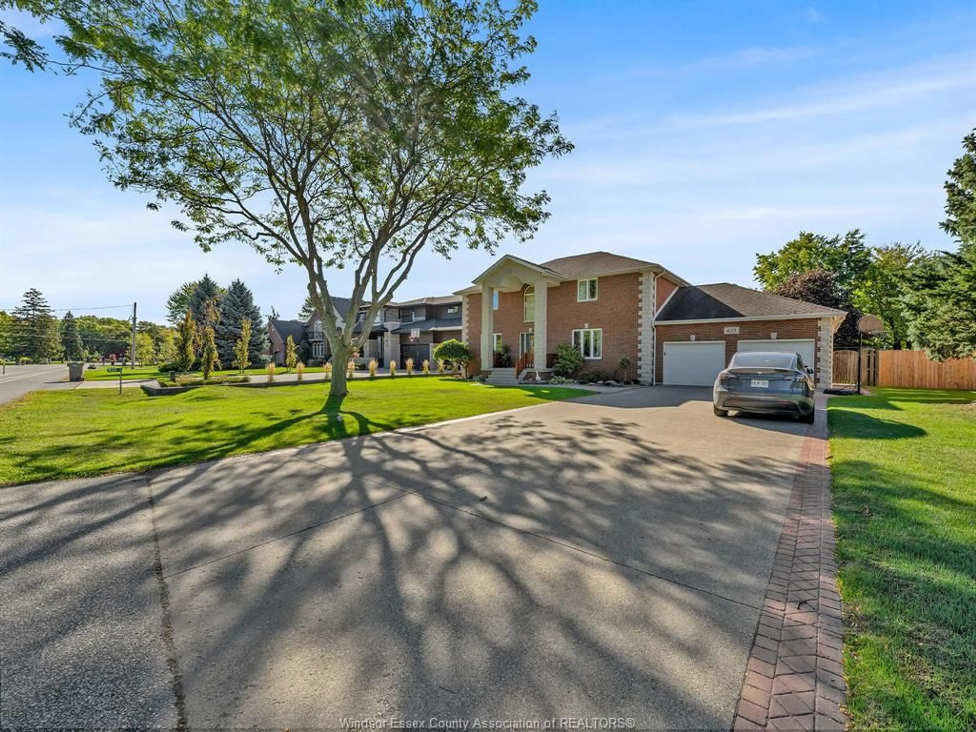 A pic from outside/outdoor area/front of a property/back of a property/a pic from drone, street for 633 OLD TECUMSEH Rd, Lakeshore Ontario N0R 1A0