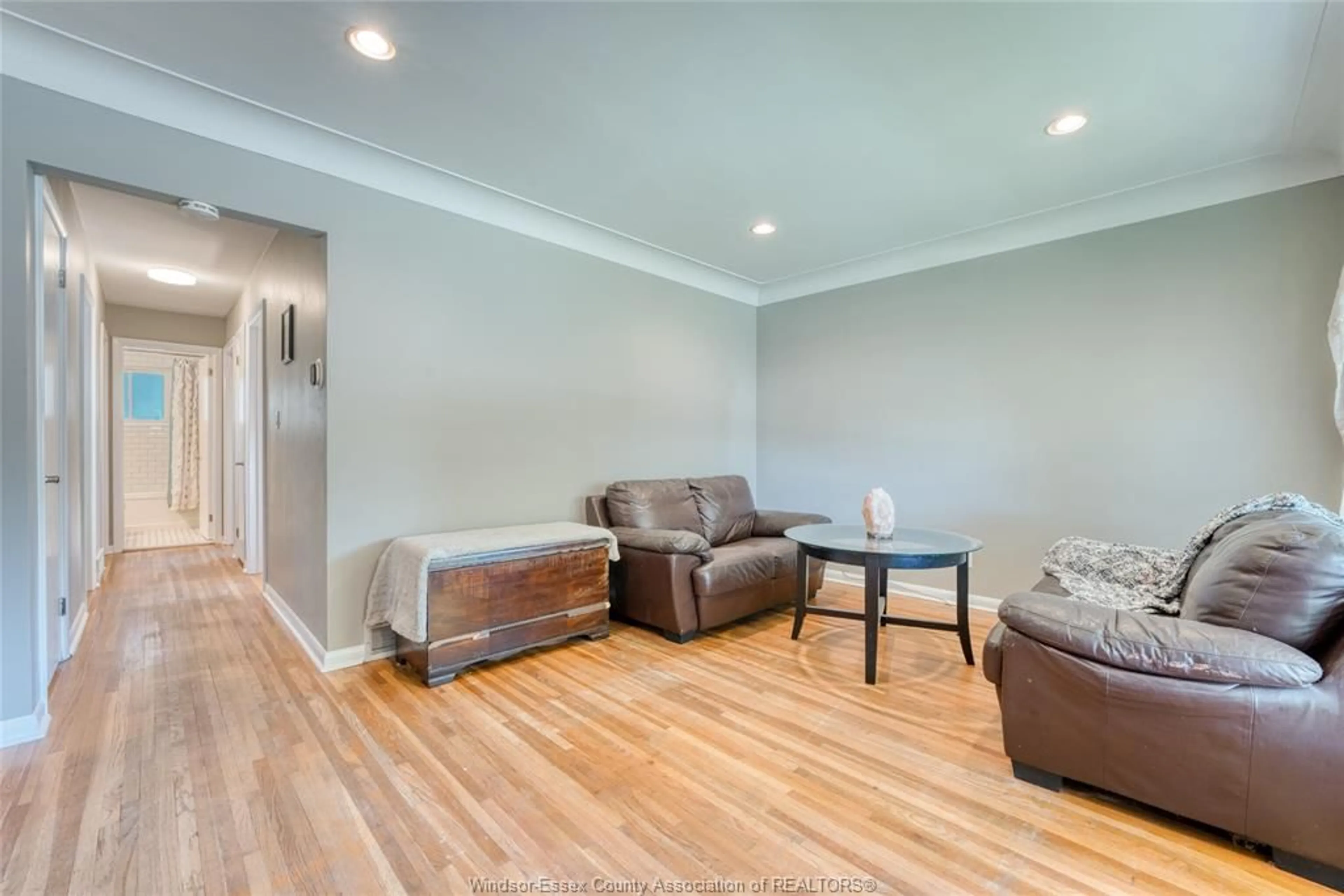 Living room with furniture, wood/laminate floor for 942 ST. PAUL Ave, Windsor Ontario N8S 3L4