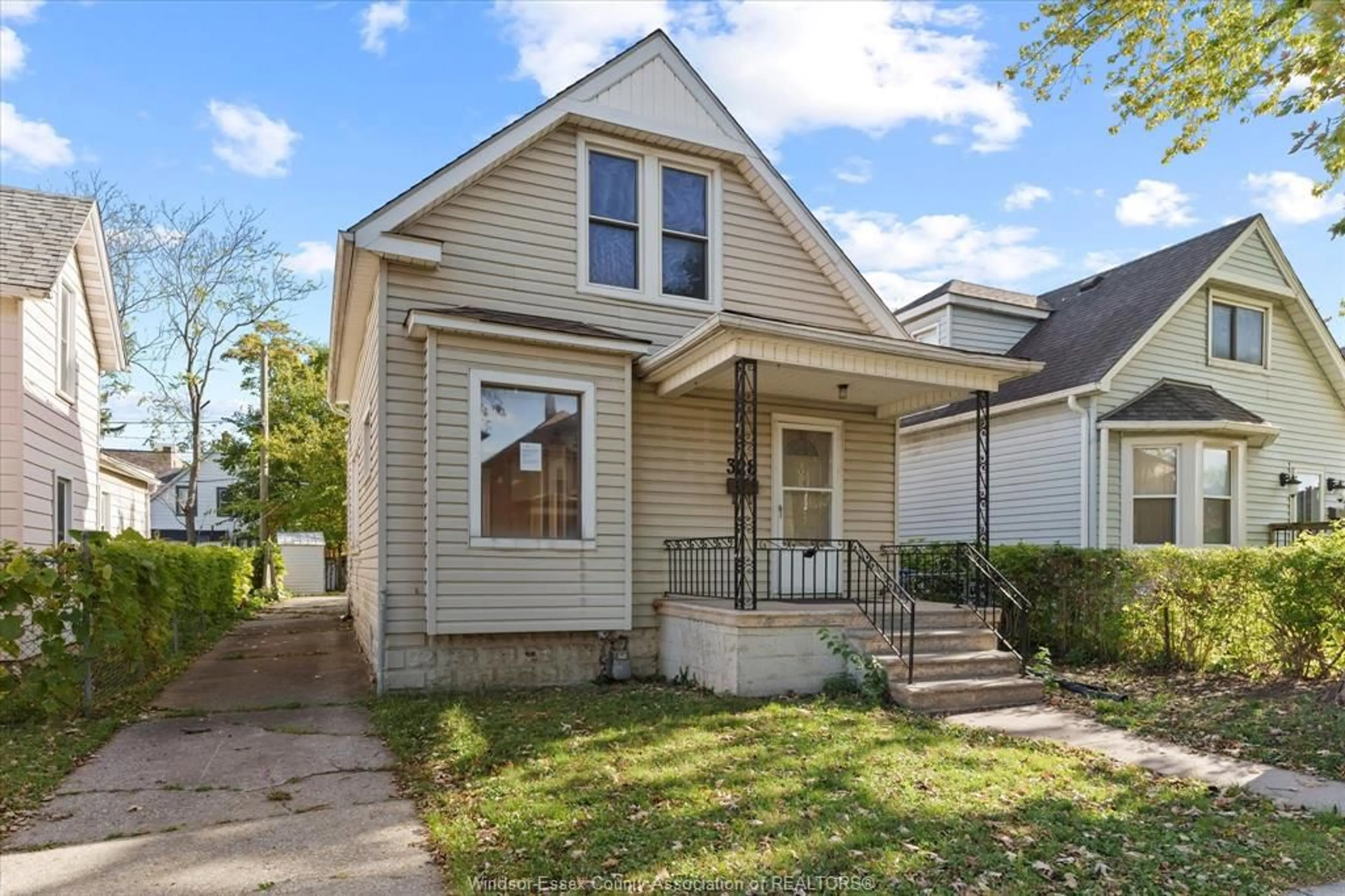 Home with vinyl exterior material, street for 328 BRIDGE Ave, Windsor Ontario N9B 2M4