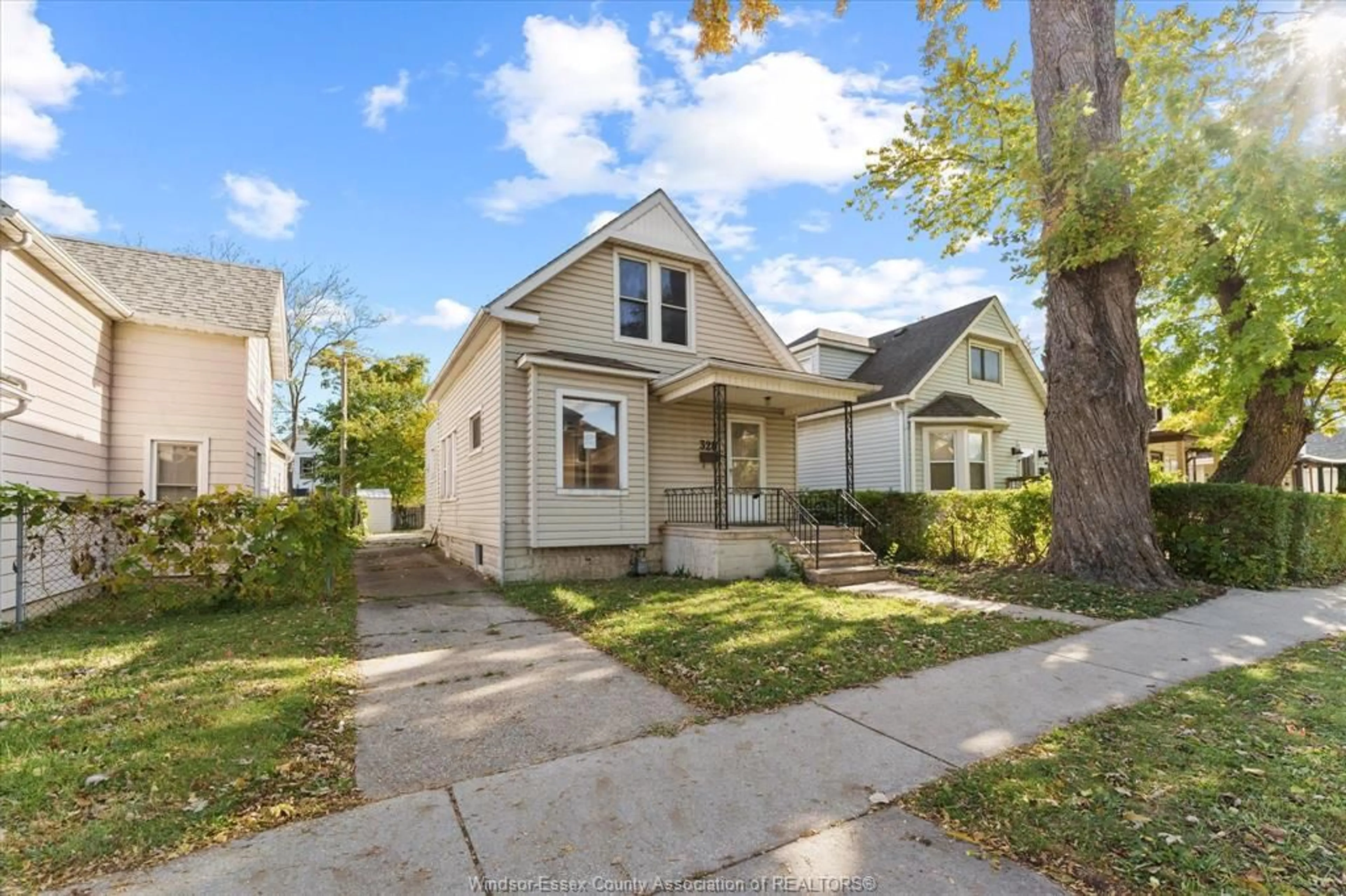 Home with vinyl exterior material, street for 328 BRIDGE Ave, Windsor Ontario N9B 2M4