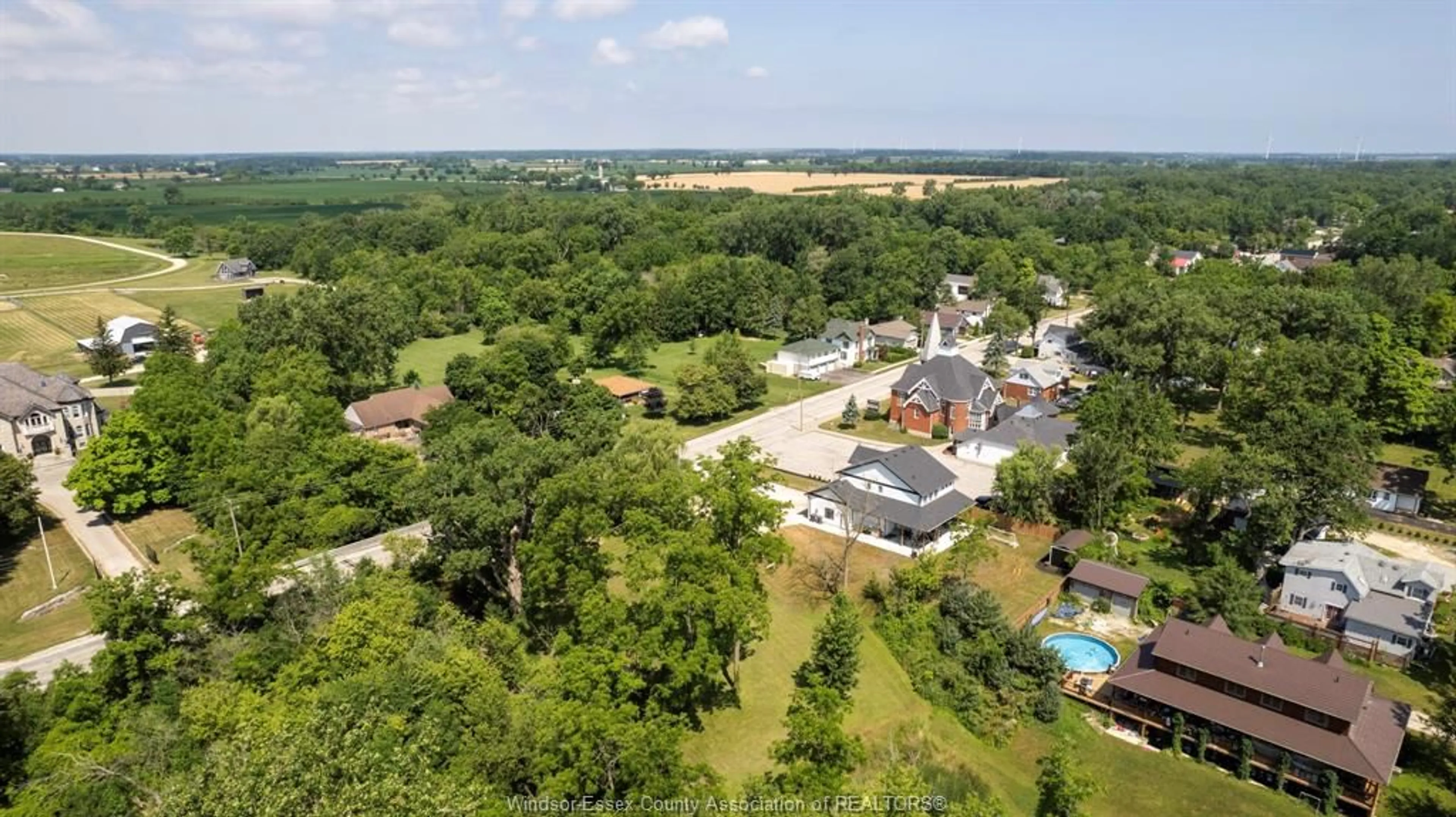 A pic from outside/outdoor area/front of a property/back of a property/a pic from drone, water/lake/river/ocean view for 2618 COUNTY RD 27, Woodslee Ontario N0R 1V0