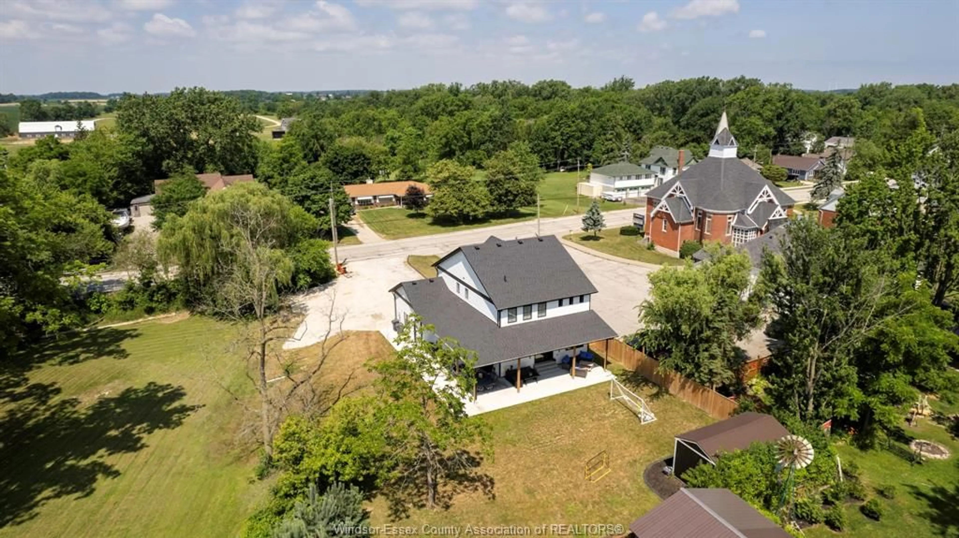 A pic from outside/outdoor area/front of a property/back of a property/a pic from drone, unknown for 2618 COUNTY RD 27, Woodslee Ontario N0R 1V0