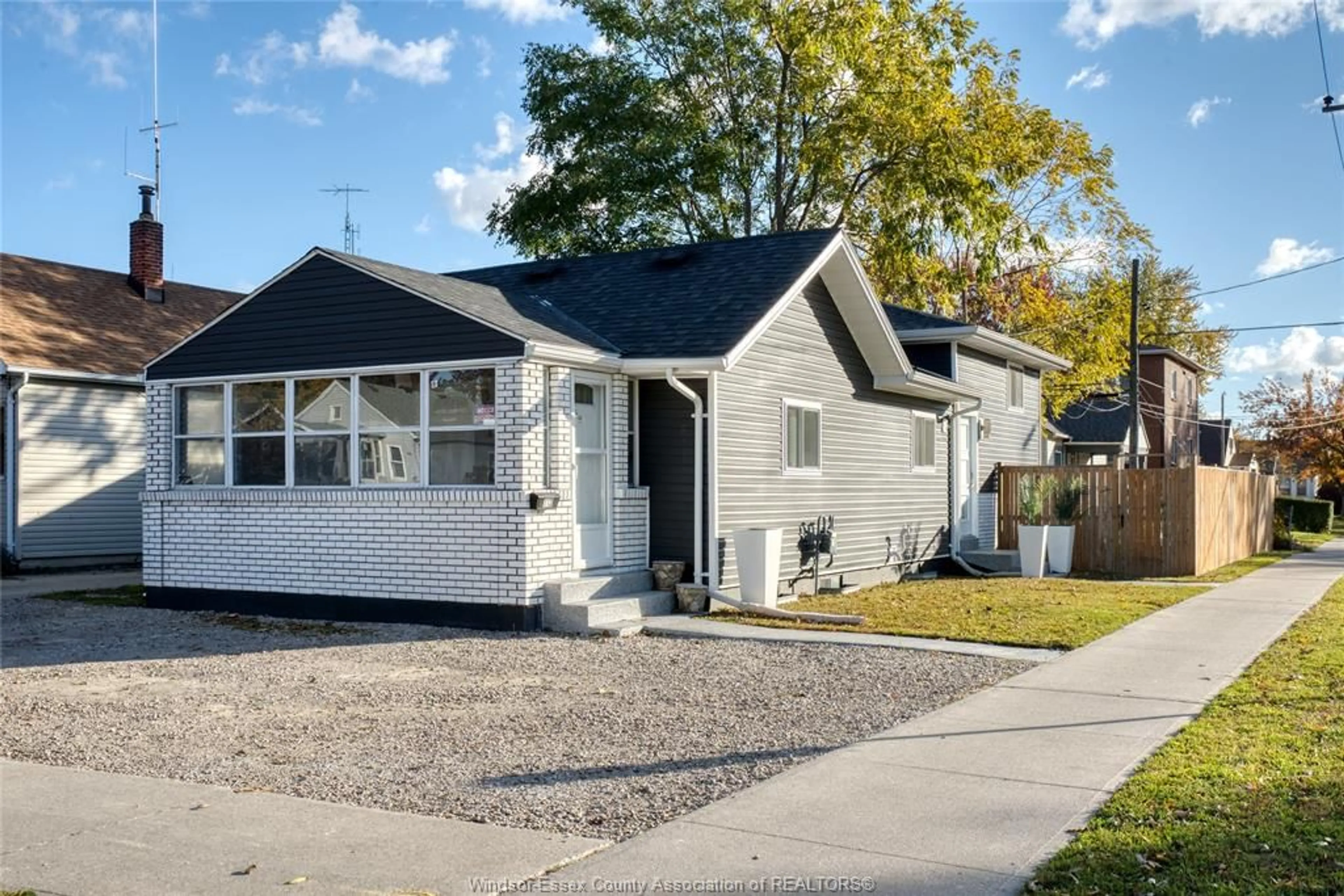 Home with vinyl exterior material, street for 112 WIGLE, Leamington Ontario N8H 2T2