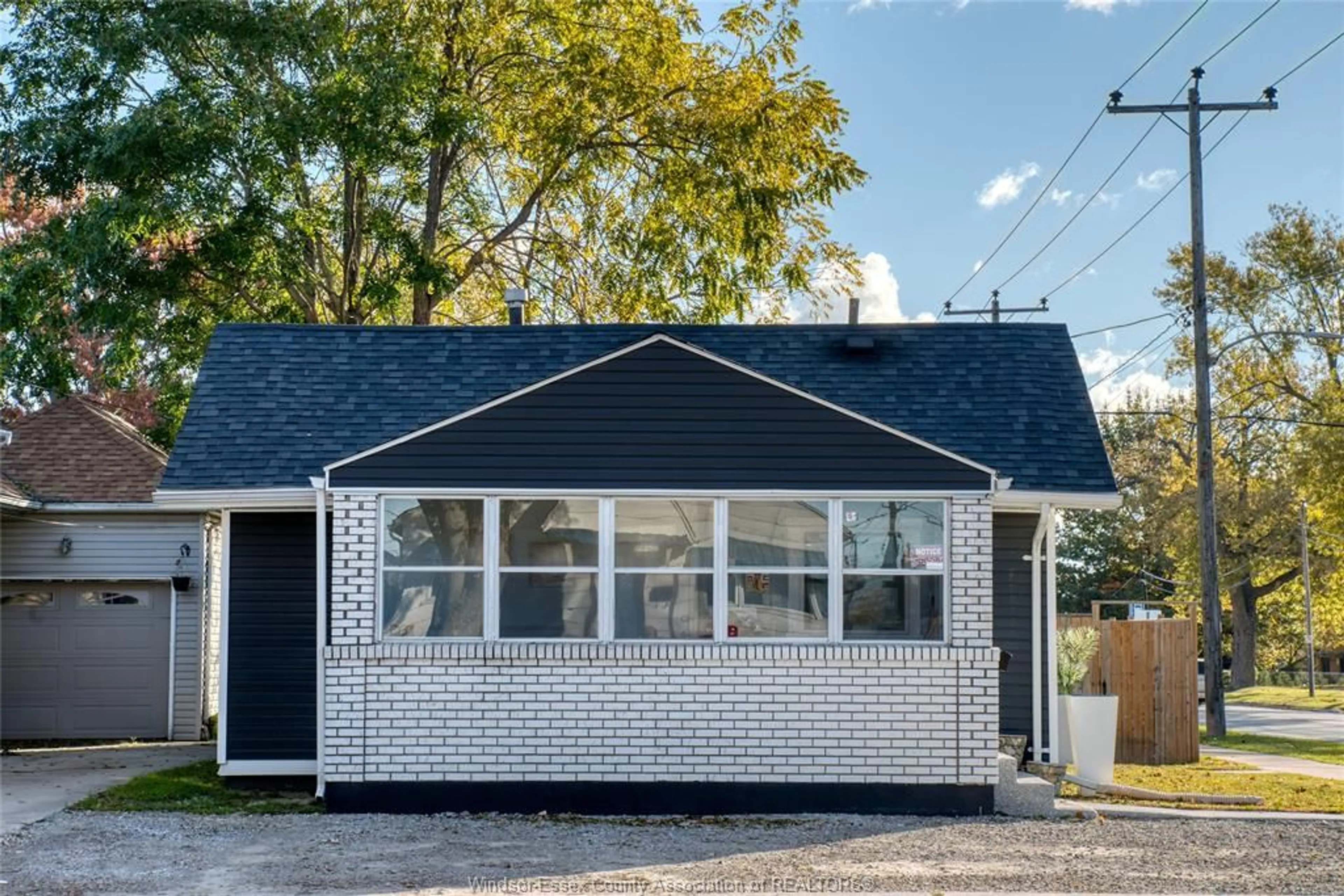 Home with vinyl exterior material, street for 112 WIGLE, Leamington Ontario N8H 2T2