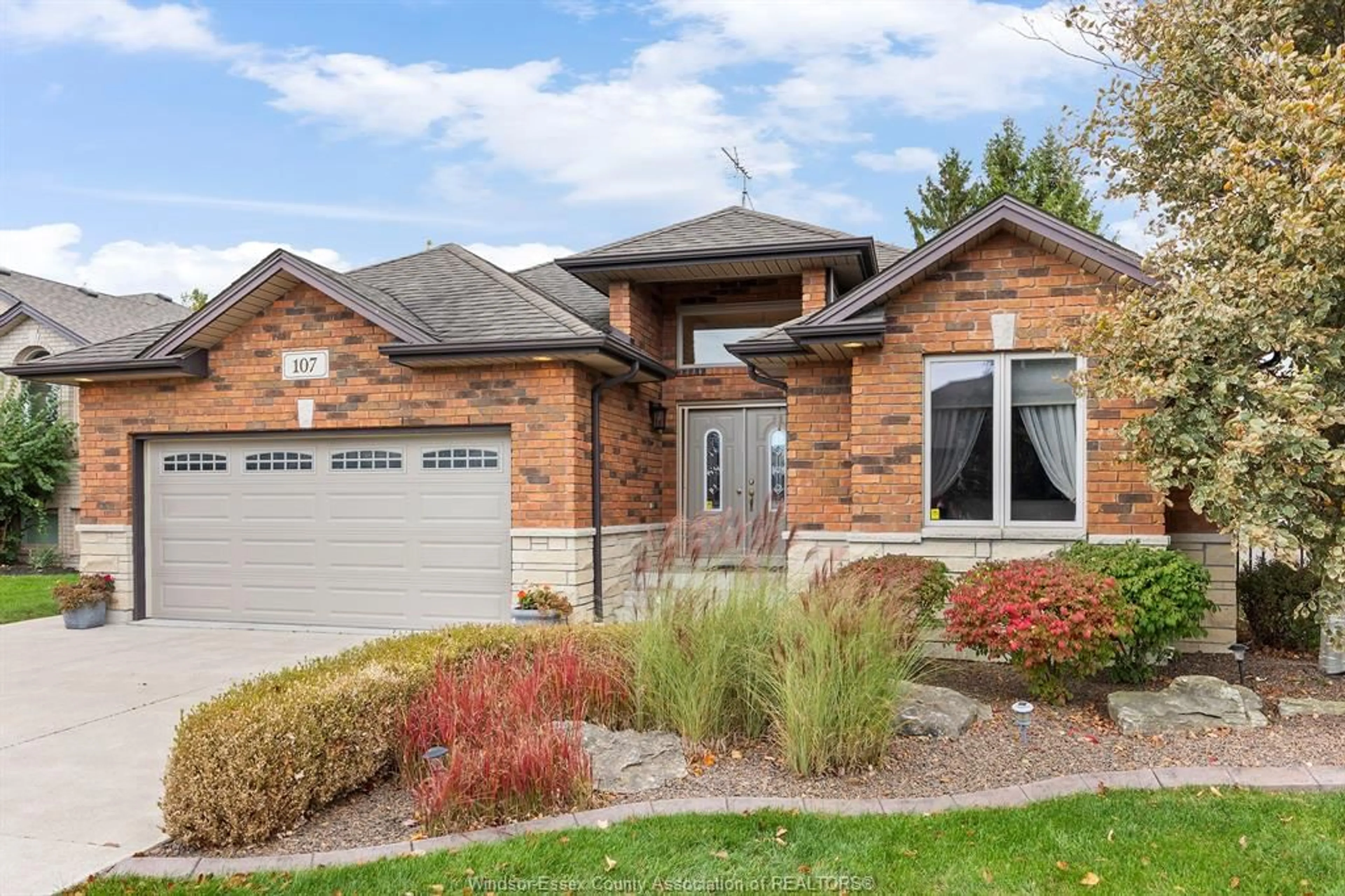 Home with brick exterior material, street for 107 THRASHER Dr, Amherstburg Ontario N9V 4E6