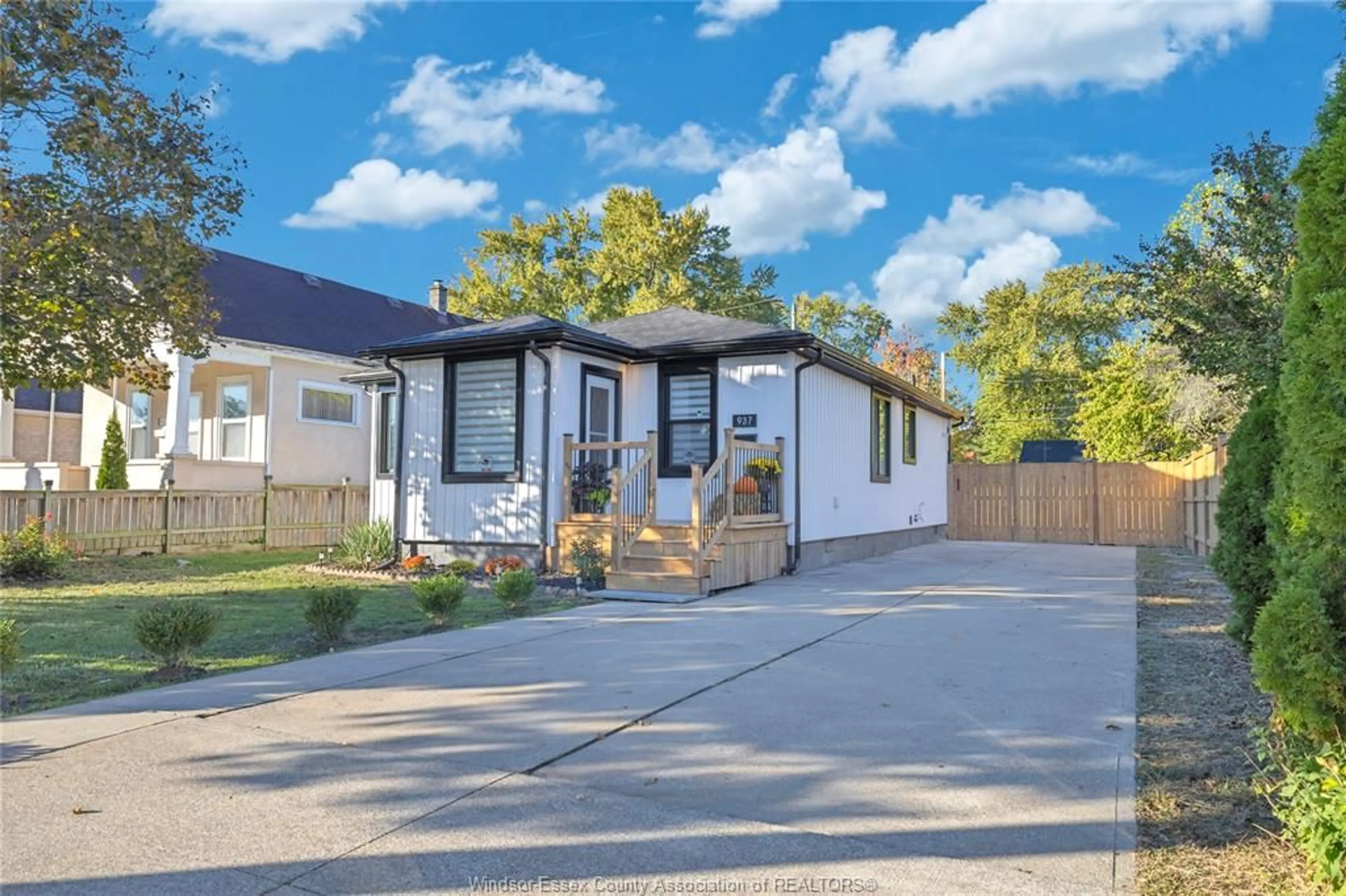 Home with vinyl exterior material, street for 937 LAUZON Rd, Windsor Ontario N8S 3M4