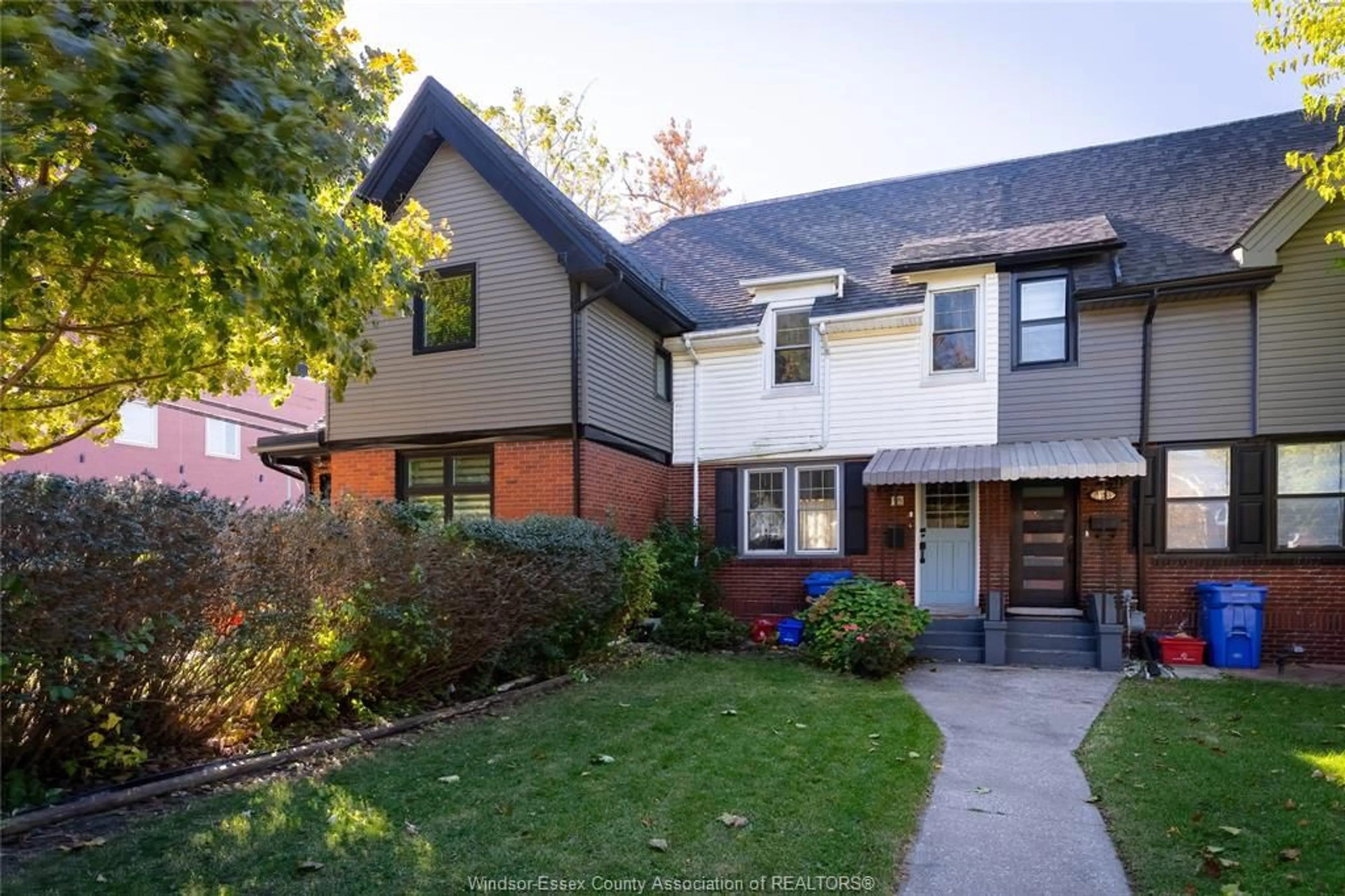 Home with brick exterior material, street for 1295 Monmouth Rd, Windsor Ontario N8Y 3M2