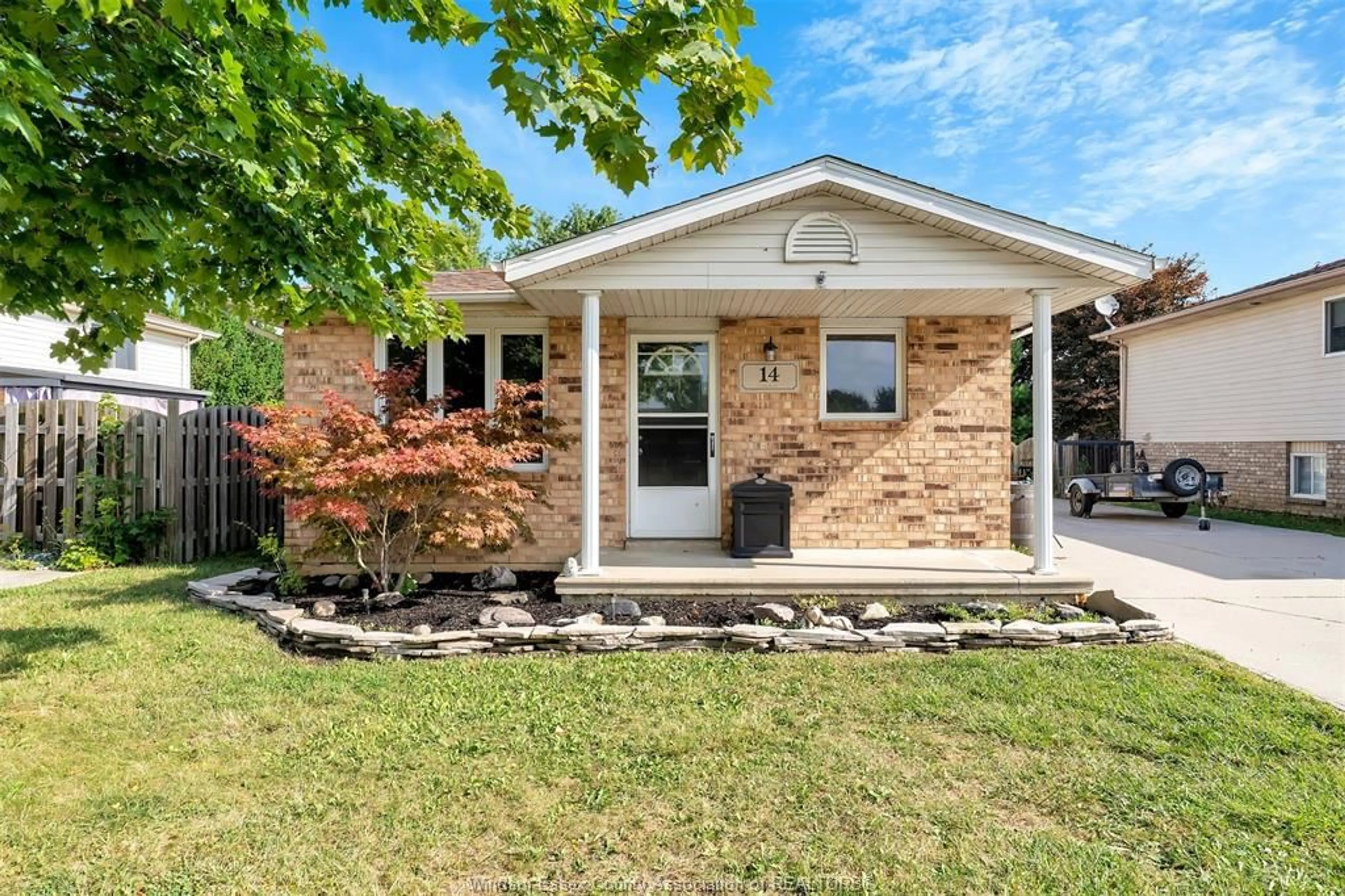 Home with brick exterior material, street for 14 Azar Ave, Tilbury Ontario N0P 2L0