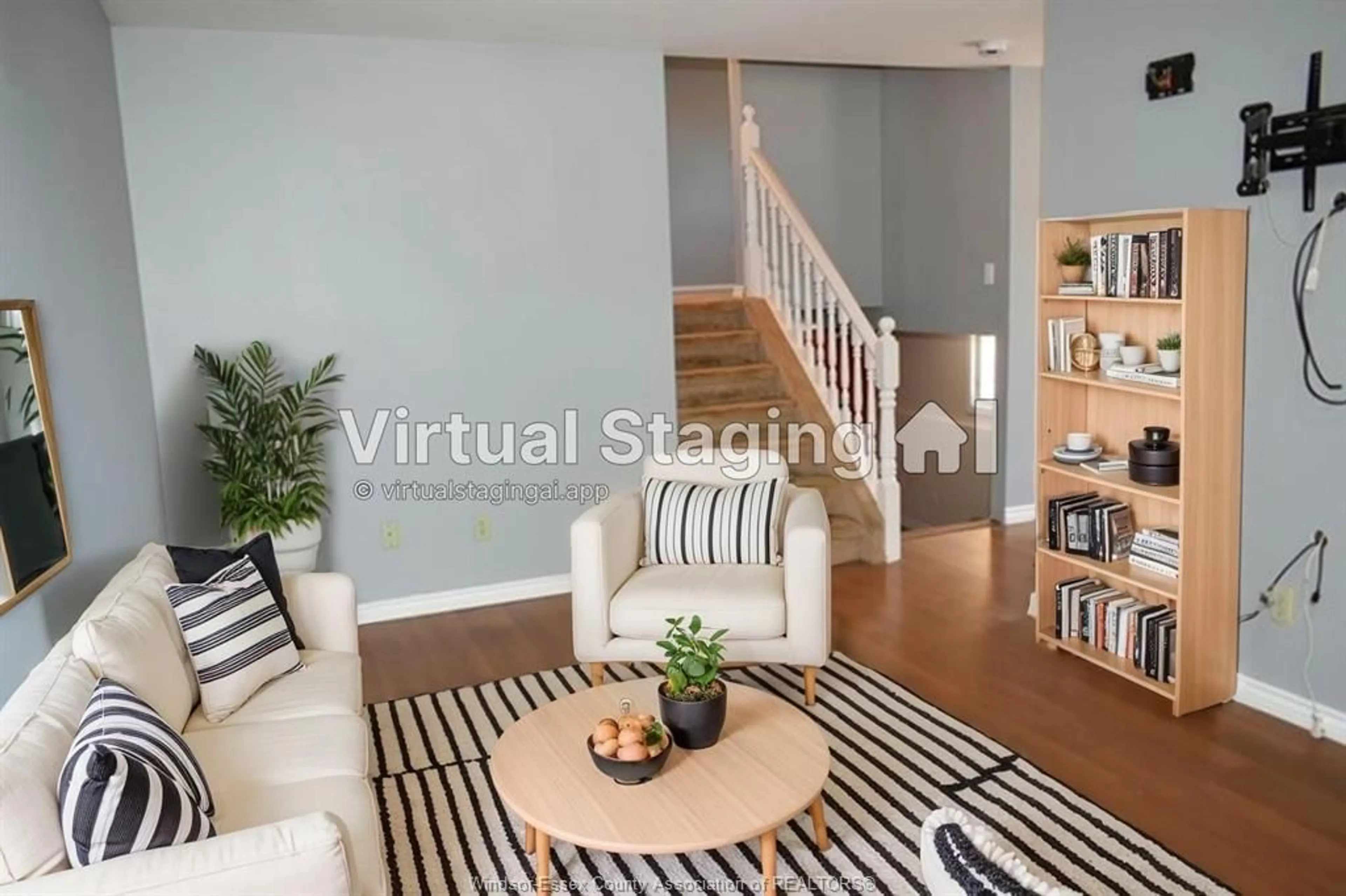 Living room with furniture, wood/laminate floor for 14 Azar Ave, Tilbury Ontario N0P 2L0