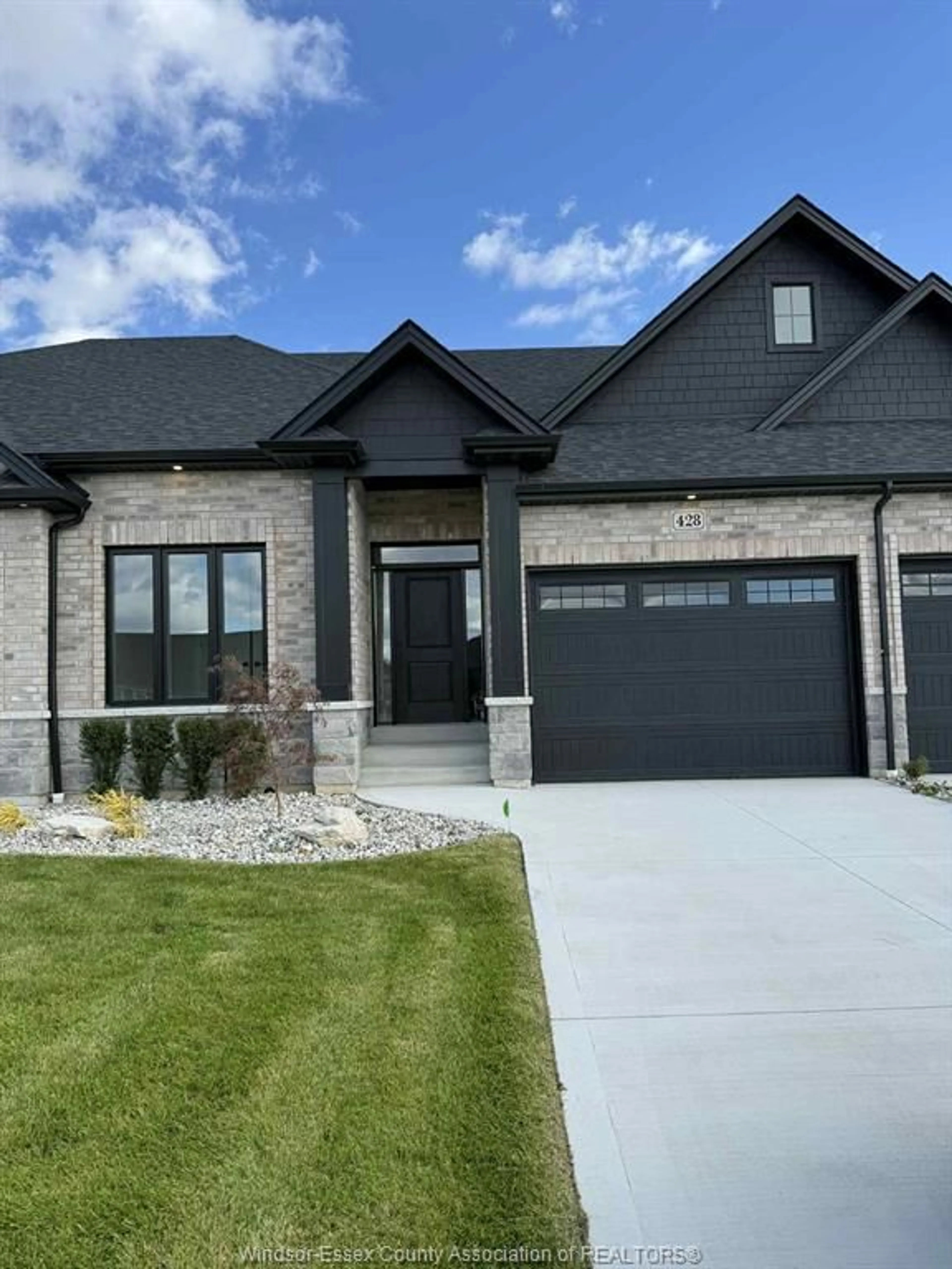 Home with brick exterior material, street for 428 CASERTA Cres, Lakeshore Ontario N0R 1A0