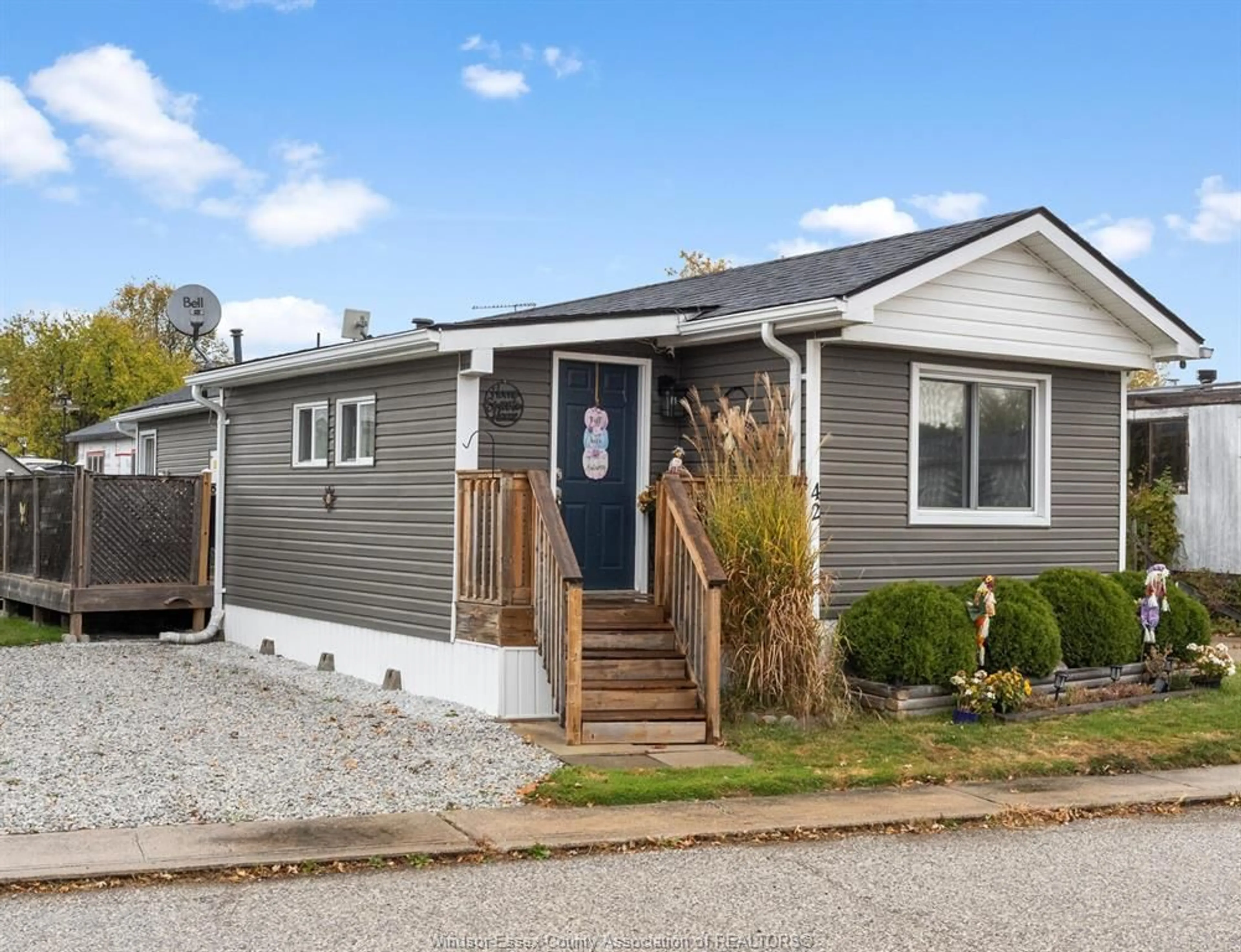 Home with vinyl exterior material, street for 42 WILDER Dr, Lakeshore Ontario N8N 2S2