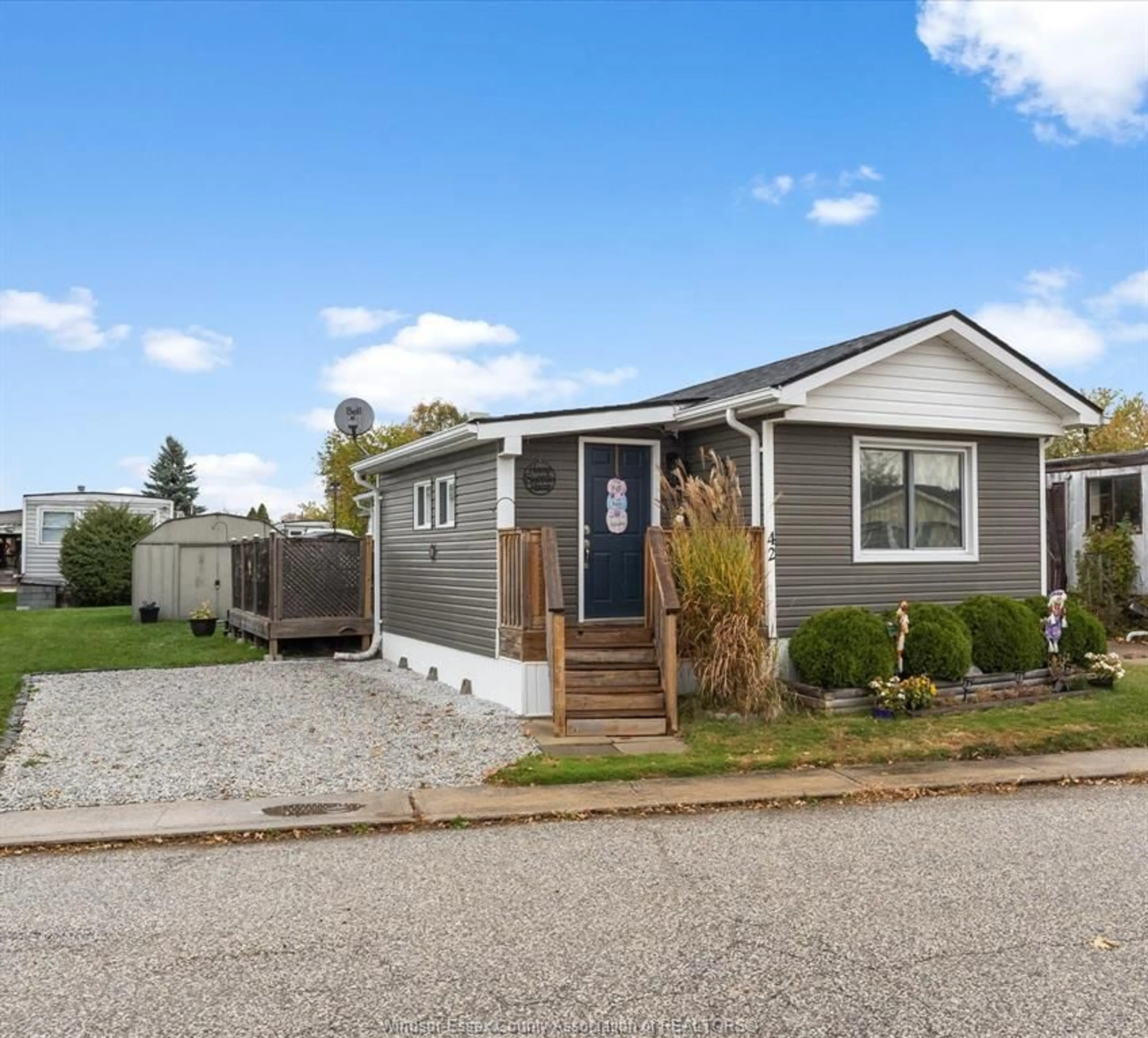 Home with vinyl exterior material, street for 42 WILDER Dr, Lakeshore Ontario N8N 2S2