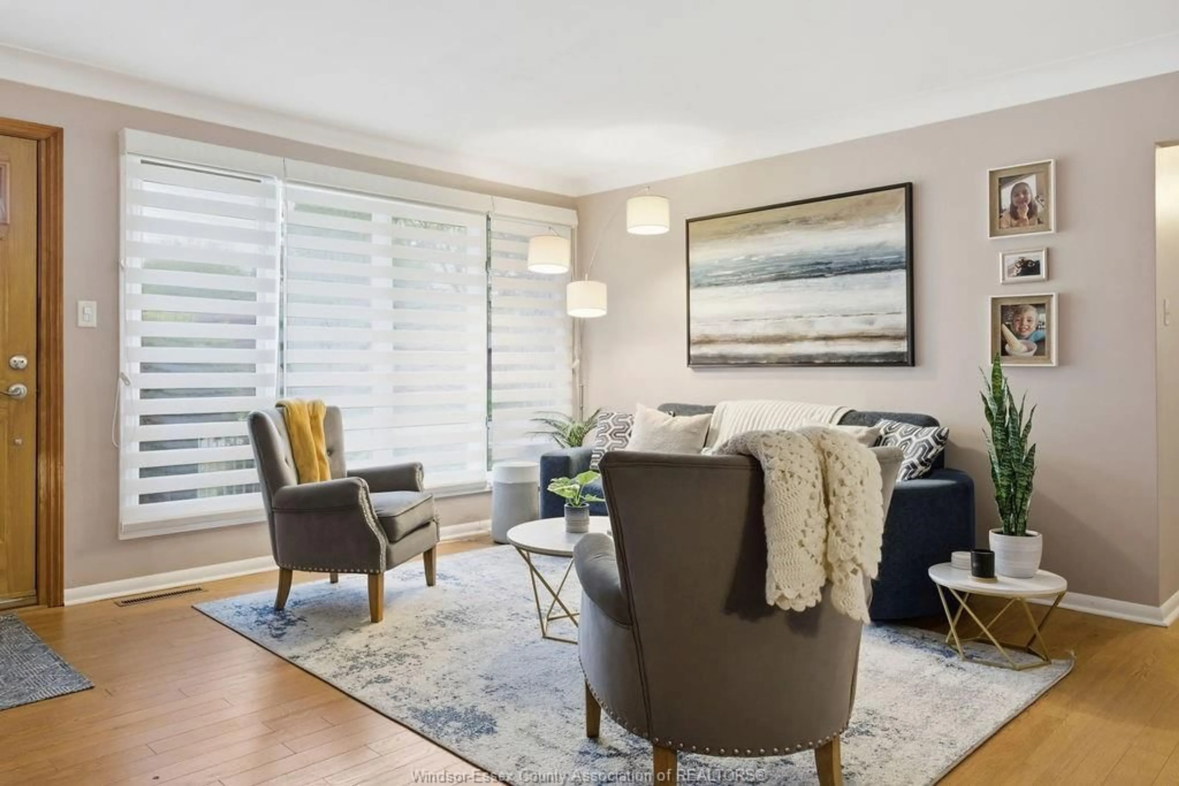 Living room with furniture, wood/laminate floor for 3621 Askin Ave, Windsor Ontario N9E 3K1