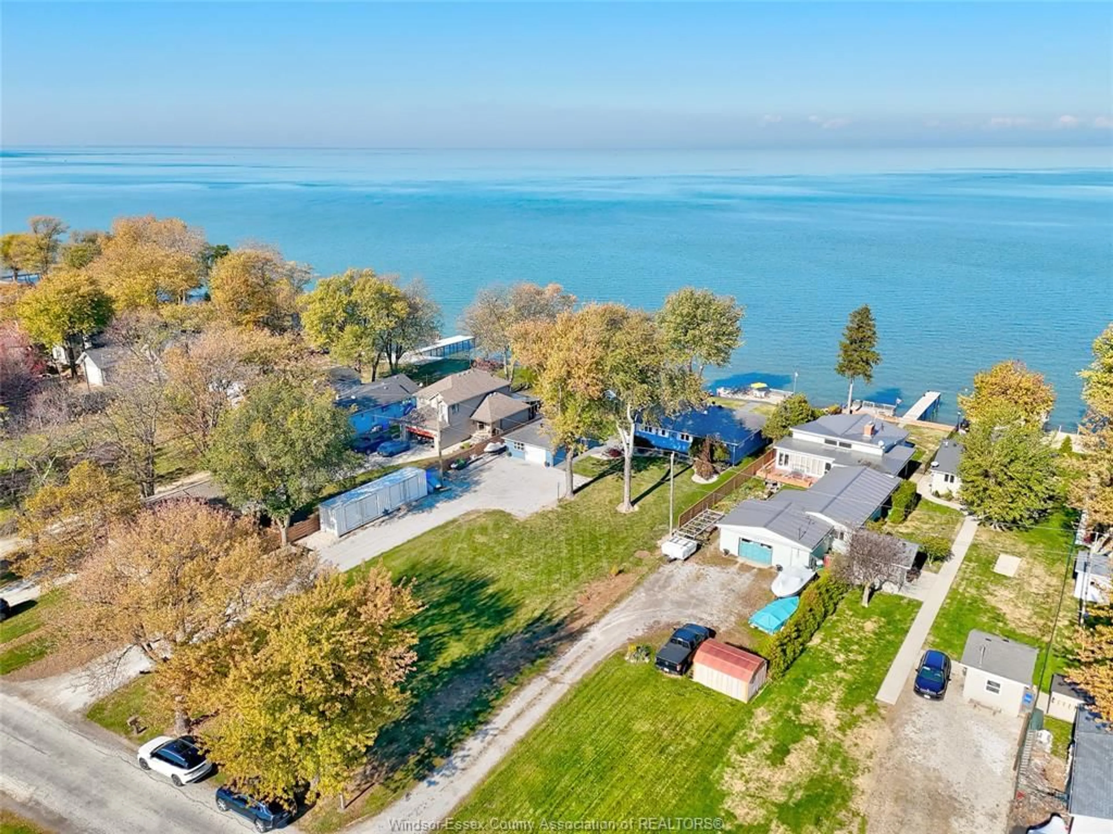 A pic from outside/outdoor area/front of a property/back of a property/a pic from drone, water/lake/river/ocean view for 423 CHARRON BEACH, Belle River Ontario N8L 1J5