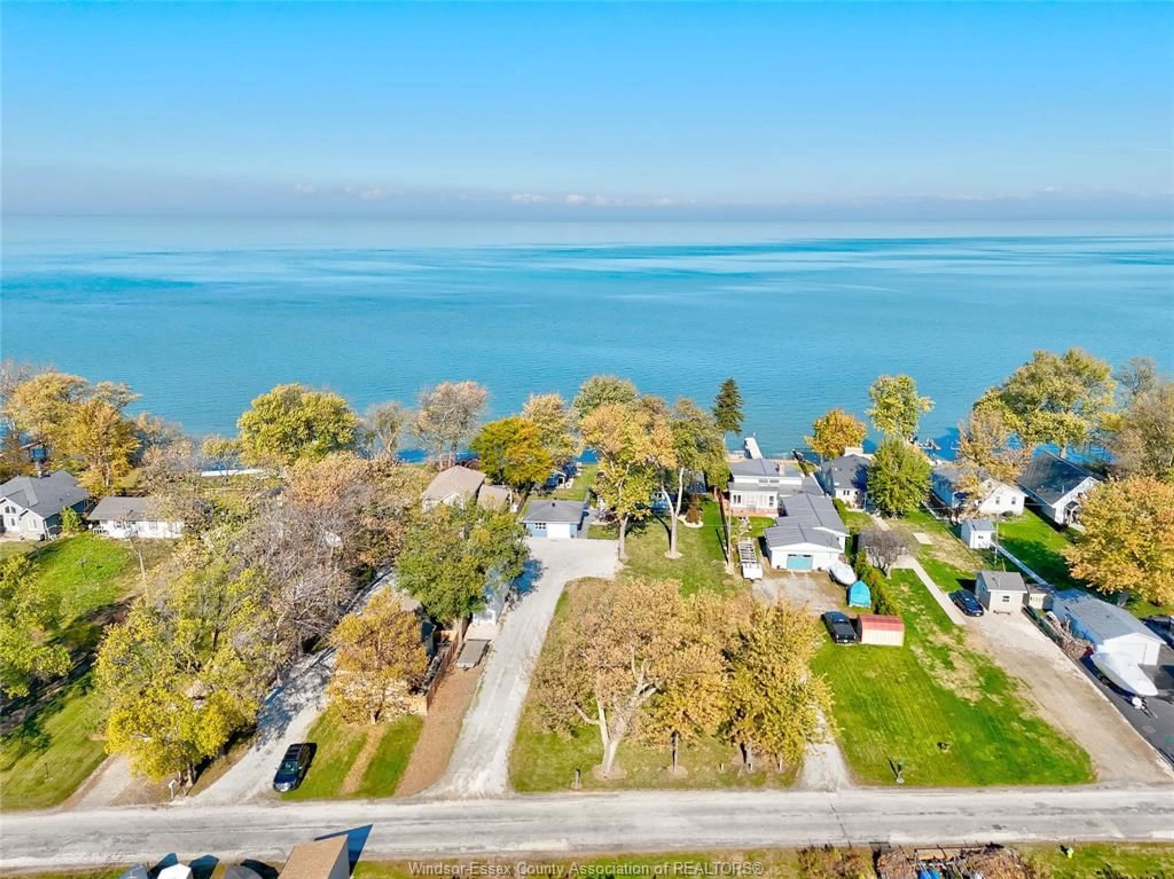 A pic from outside/outdoor area/front of a property/back of a property/a pic from drone, water/lake/river/ocean view for 423 CHARRON BEACH, Belle River Ontario N8L 1J5
