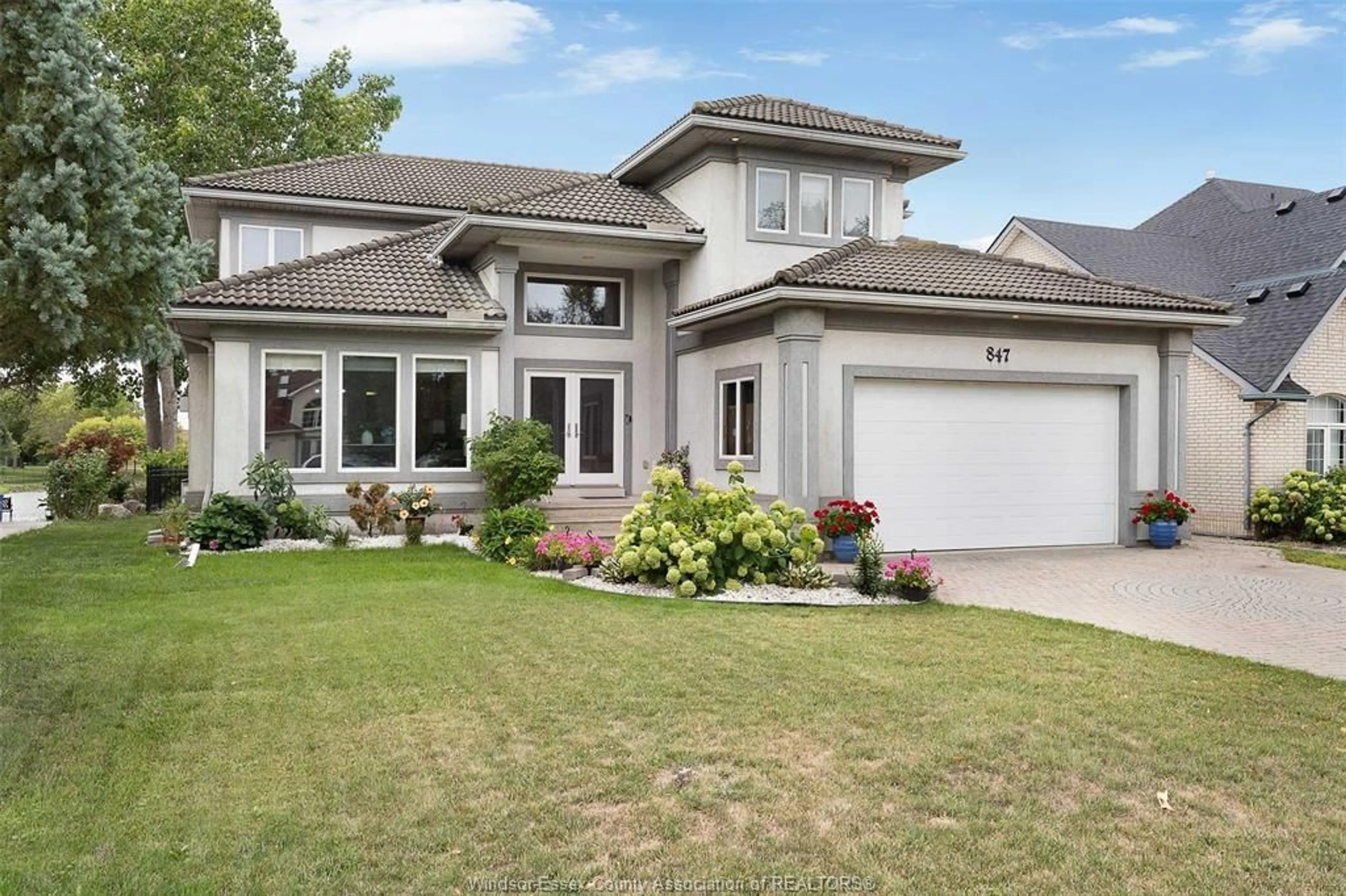 Home with vinyl exterior material, street for 847 LAKE SHORE Dr, Windsor Ontario N9G 2R1
