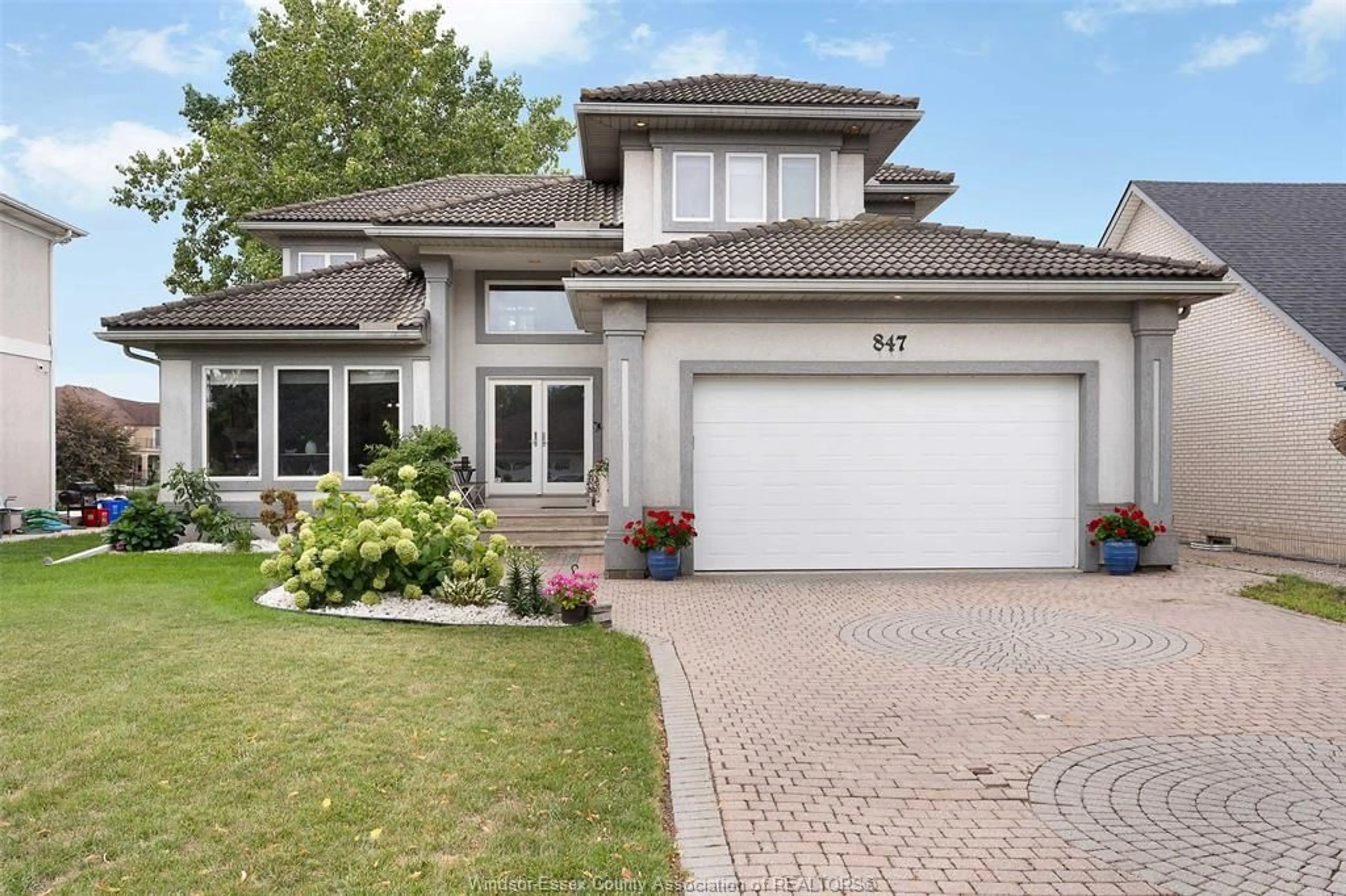 Home with brick exterior material, street for 847 LAKE SHORE Dr, Windsor Ontario N9G 2R1