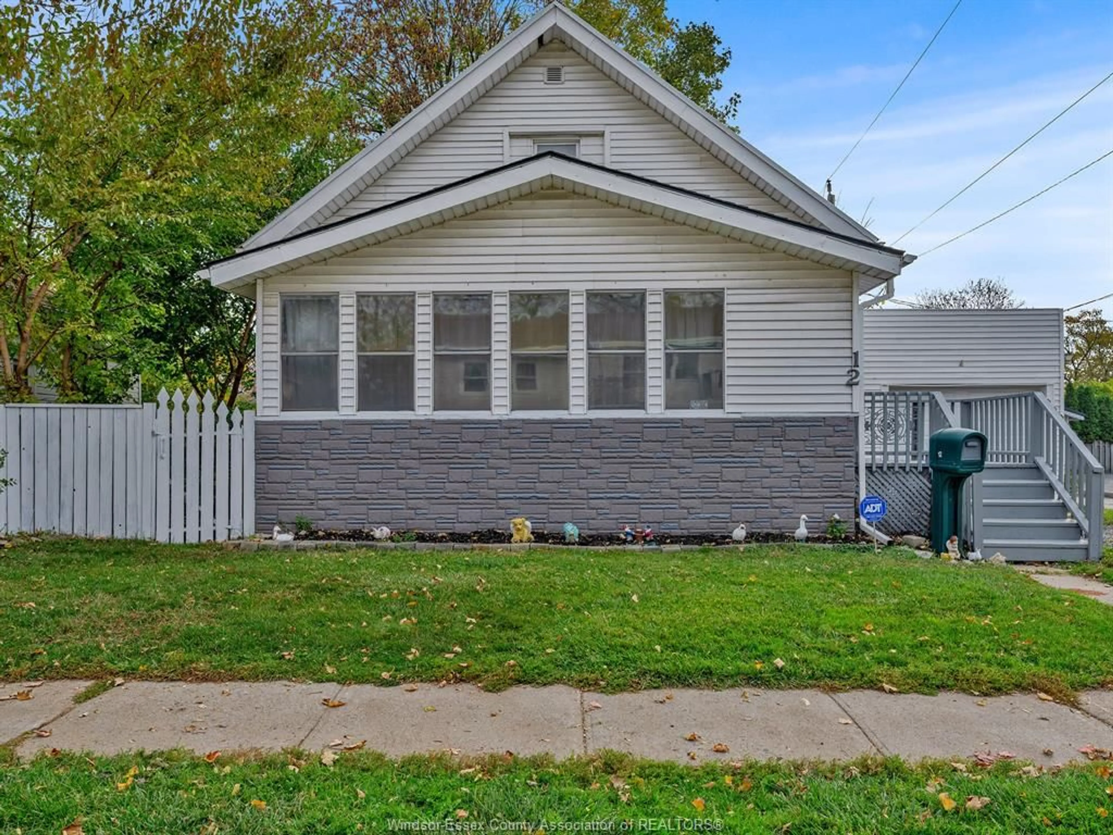 Home with vinyl exterior material, street for 12 VICTORIA, Leamington Ontario N8H 2W3