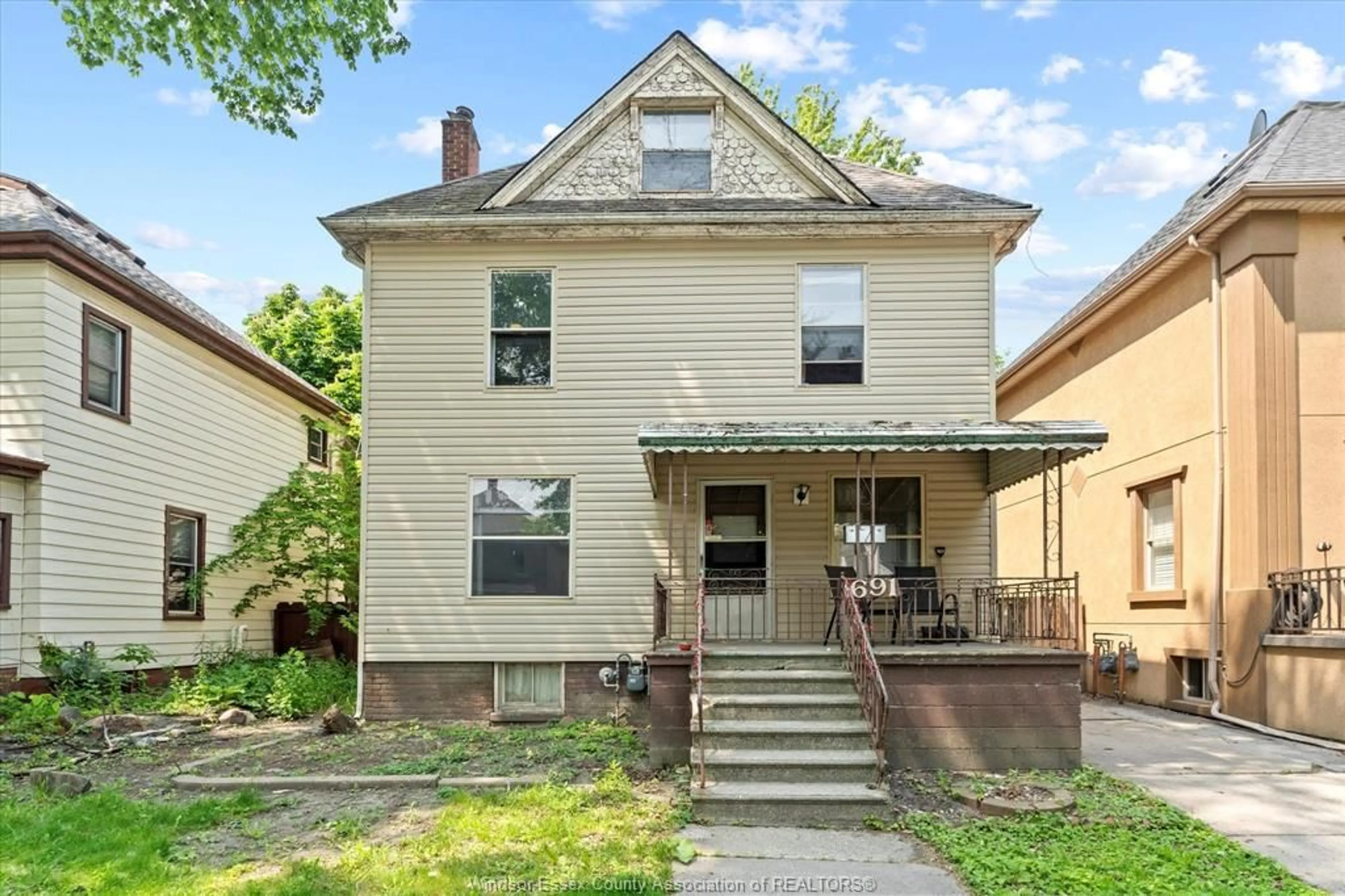 Home with brick exterior material, street for 691 WINDERMERE Rd, Windsor Ontario N8Y 3E2