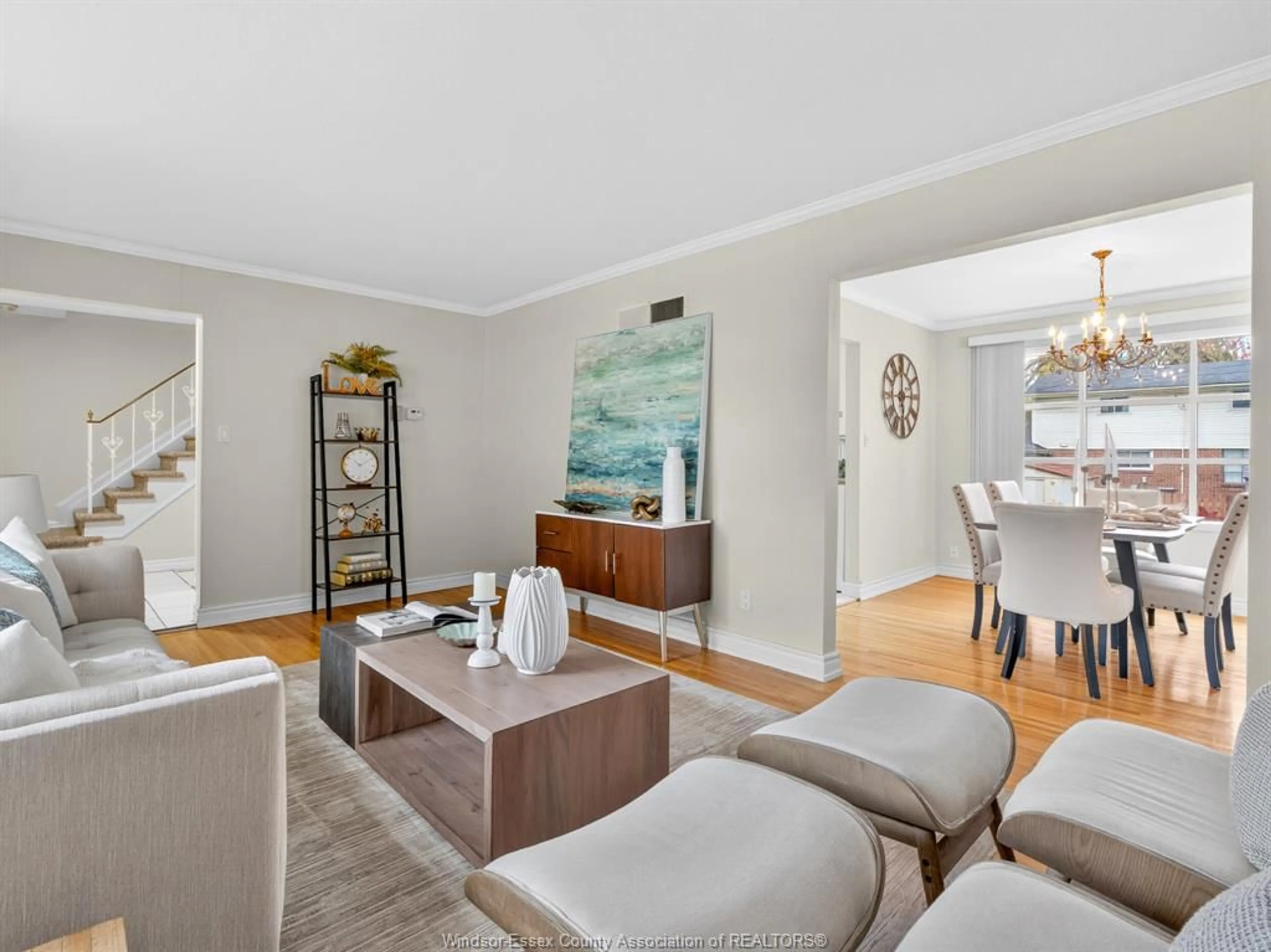 Living room with furniture, wood/laminate floor for 2945 GLENWOOD Ave, Windsor Ontario N9E 2X7