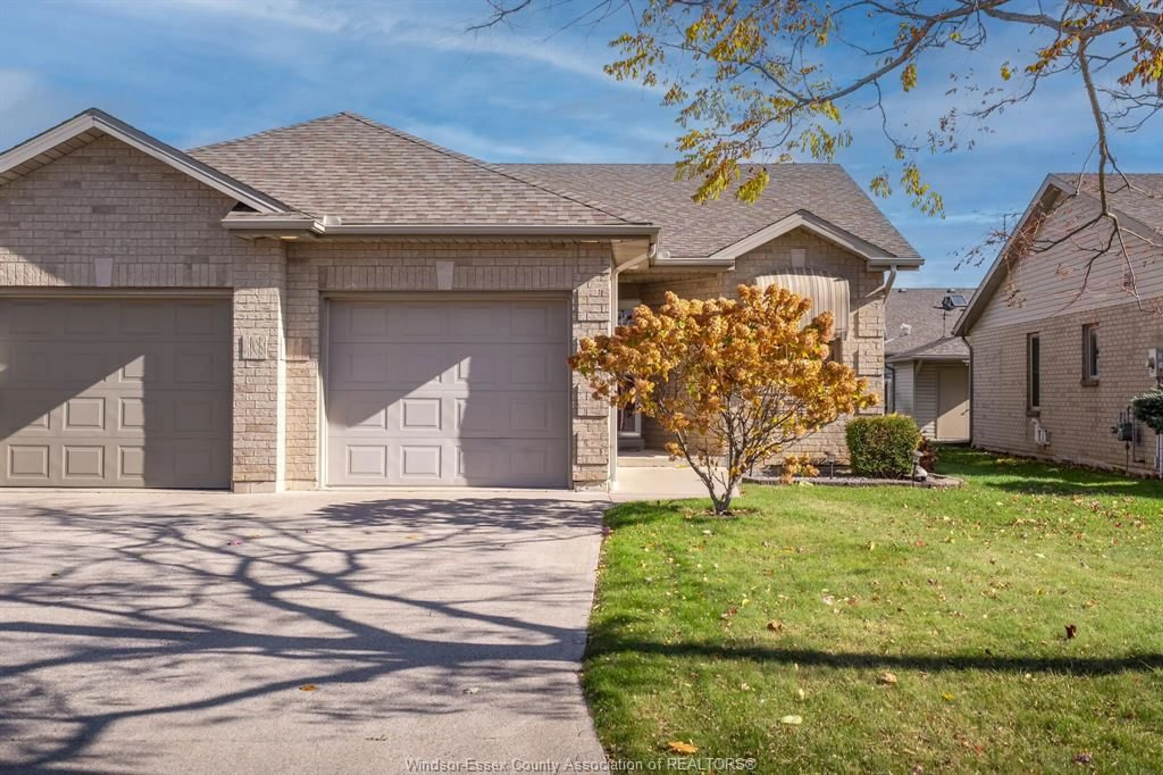 Home with brick exterior material, street for 125 Woodycrest Ave, Kingsville Ontario N9Y 4G3