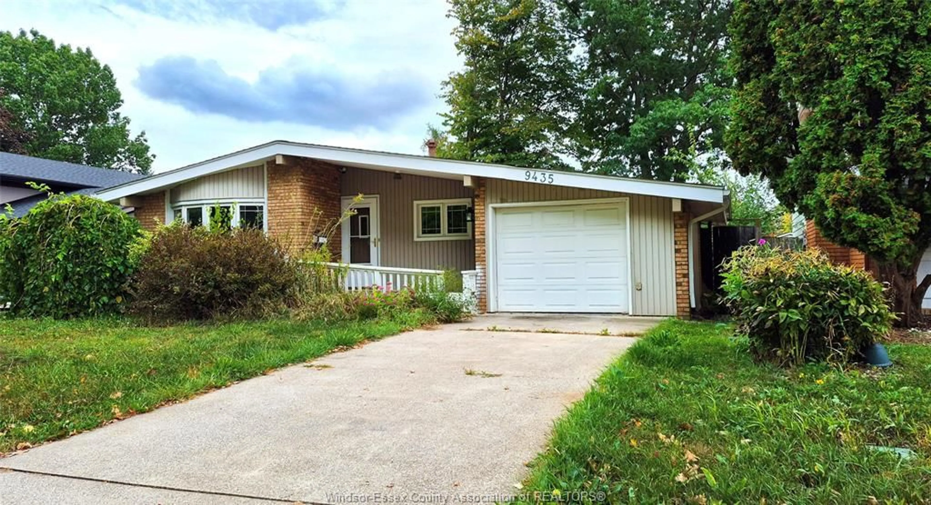Home with vinyl exterior material, street for 9435 RIDGE Rd, Windsor Ontario N8R 1G5