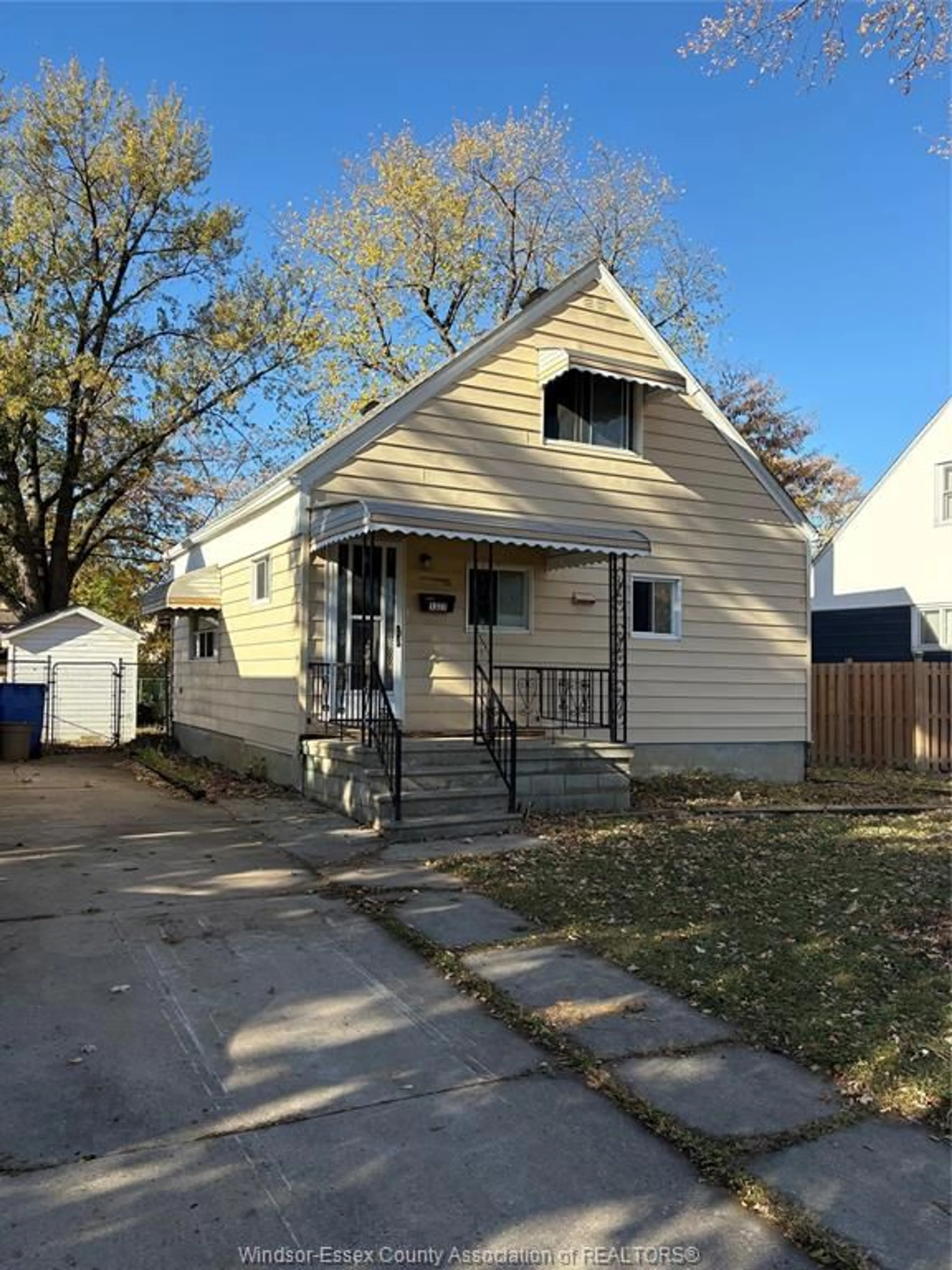 Home with vinyl exterior material, street for 1327 Tourangeau, Windsor Ontario N8Y 4J1