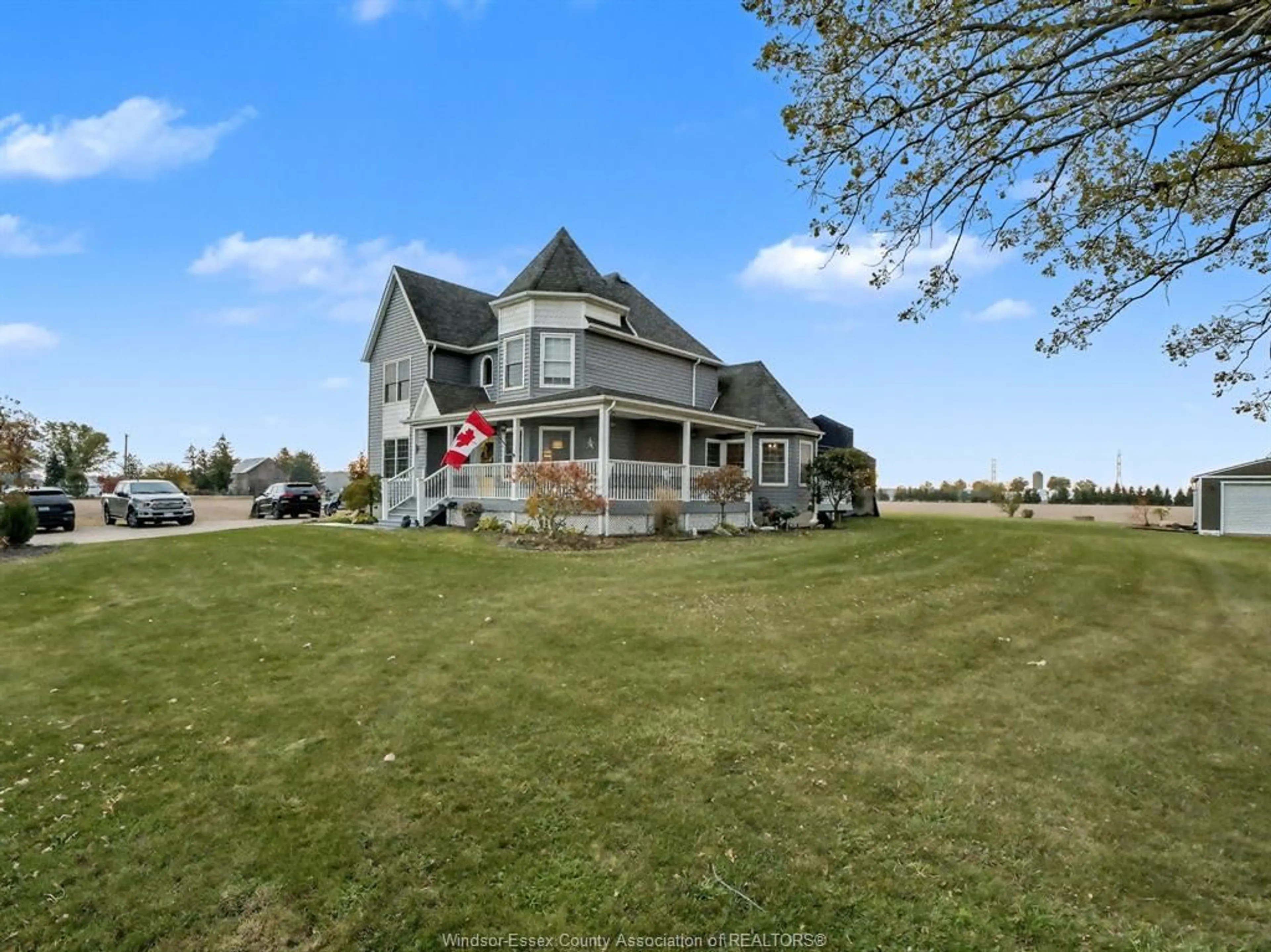 A pic from outside/outdoor area/front of a property/back of a property/a pic from drone, water/lake/river/ocean view for 771 COUNTY RD 46, Lakeshore Ontario N8M 2X7
