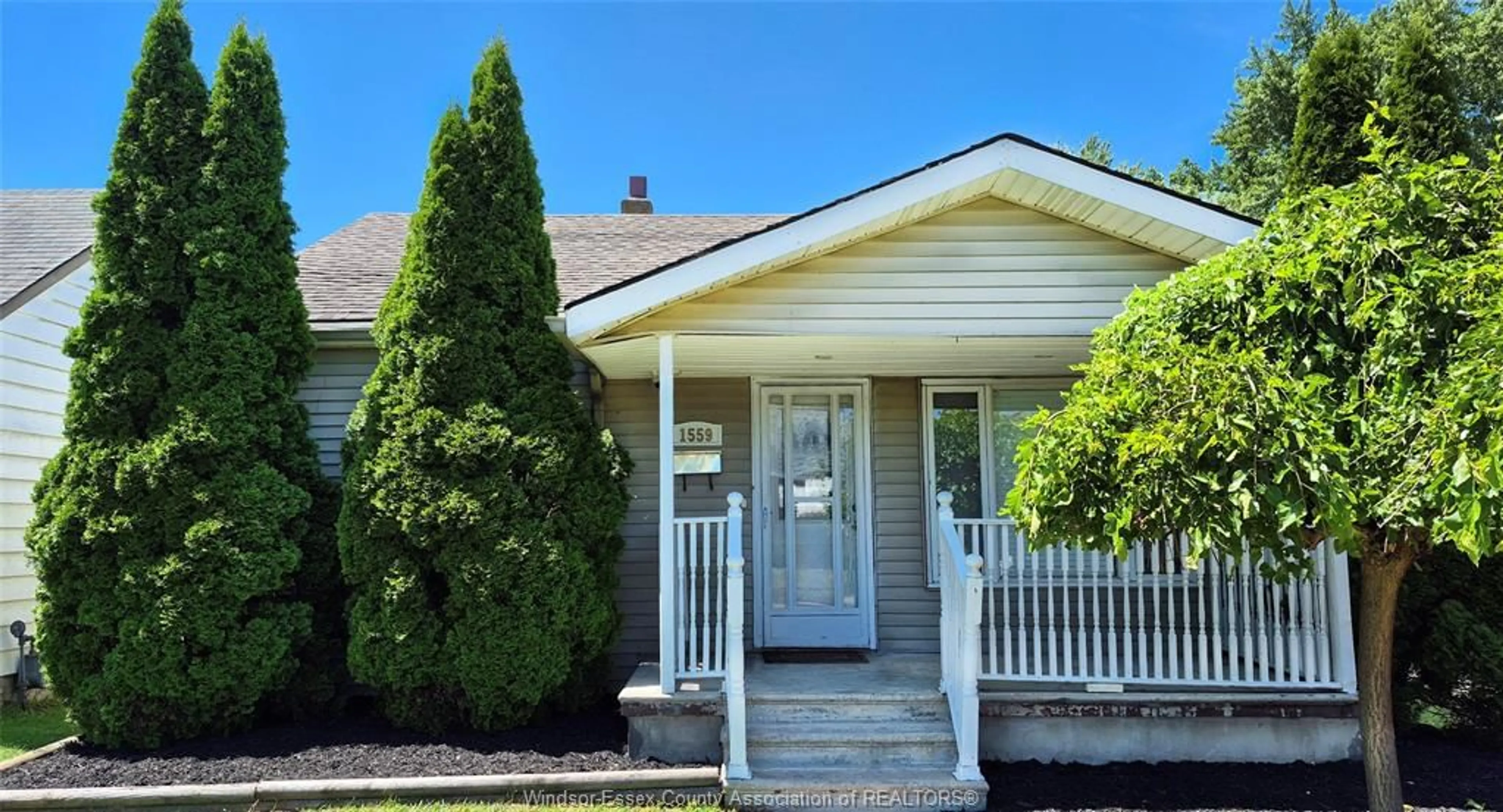 Home with vinyl exterior material, street for 1559 BUCKINGHAM Dr, Windsor Ontario N8T 2A3