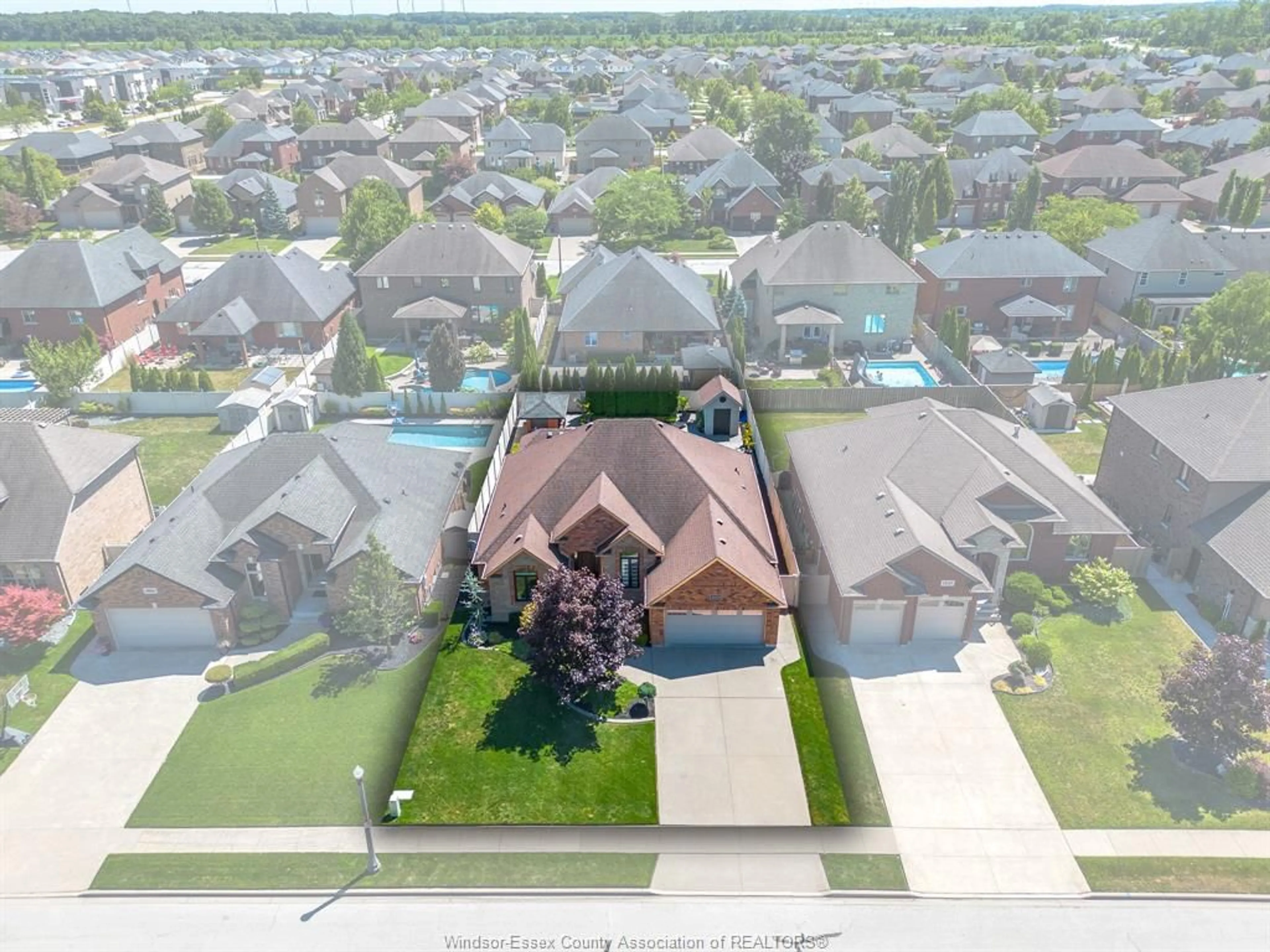 A pic from outside/outdoor area/front of a property/back of a property/a pic from drone, unknown for 1049 WOODLAND, Lakeshore Ontario N0R 1A0