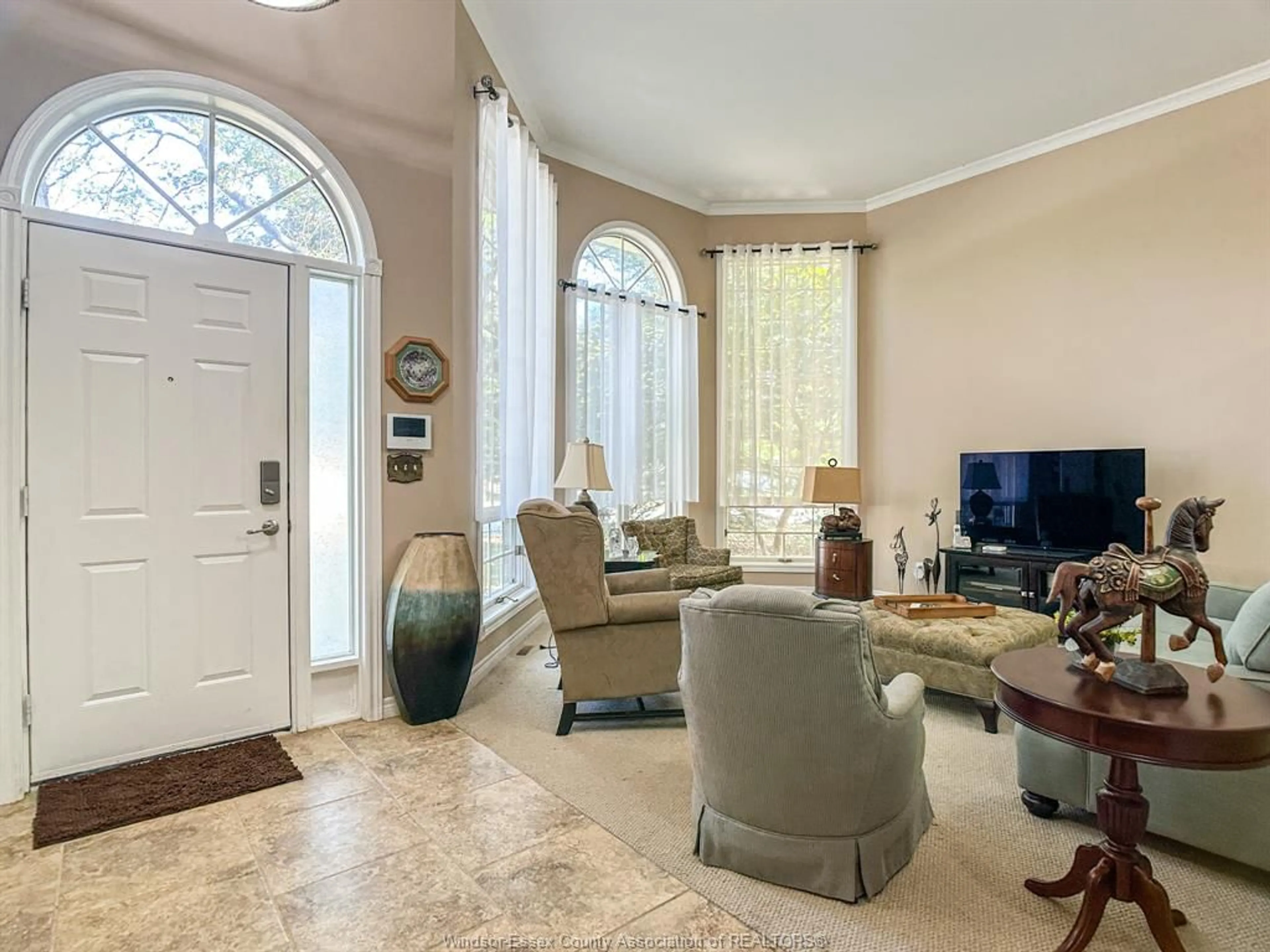 Living room with furniture, ceramic/tile floor for 1235 MINTO, LaSalle Ontario N9J 3H8