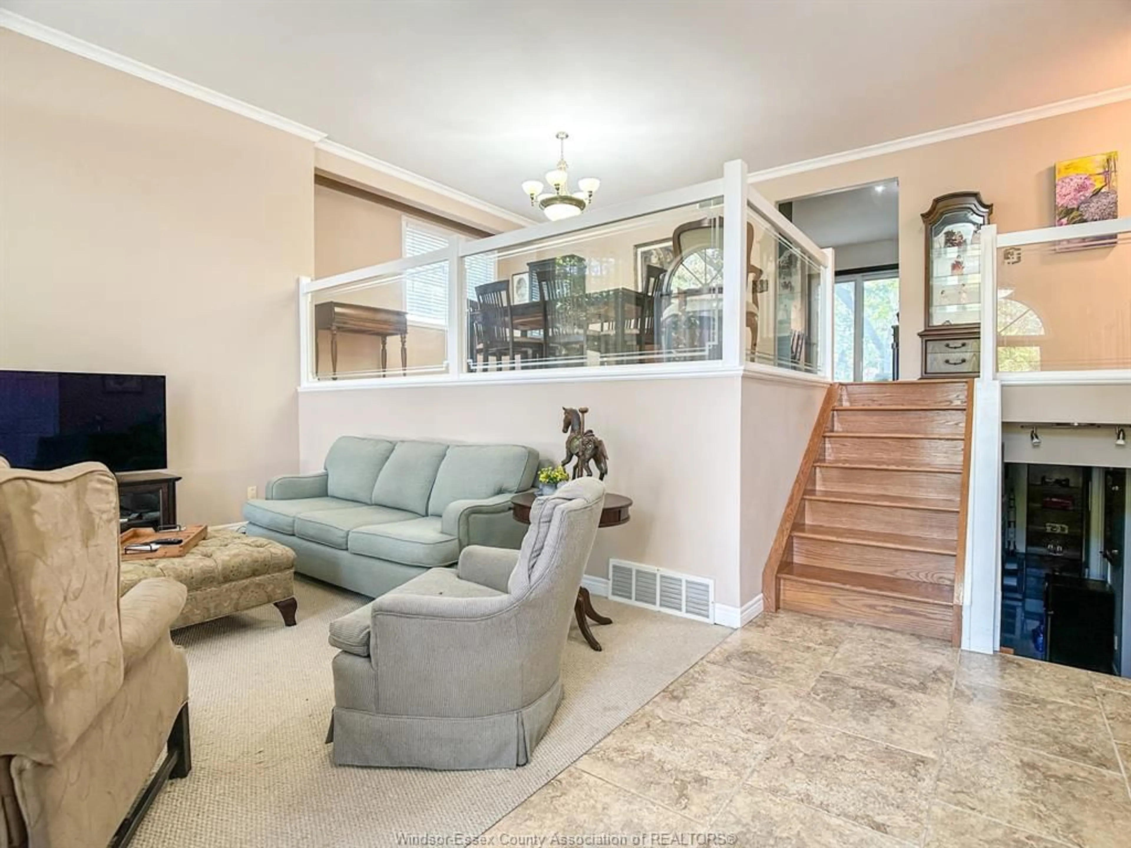 Living room with furniture, ceramic/tile floor for 1235 MINTO, LaSalle Ontario N9J 3H8