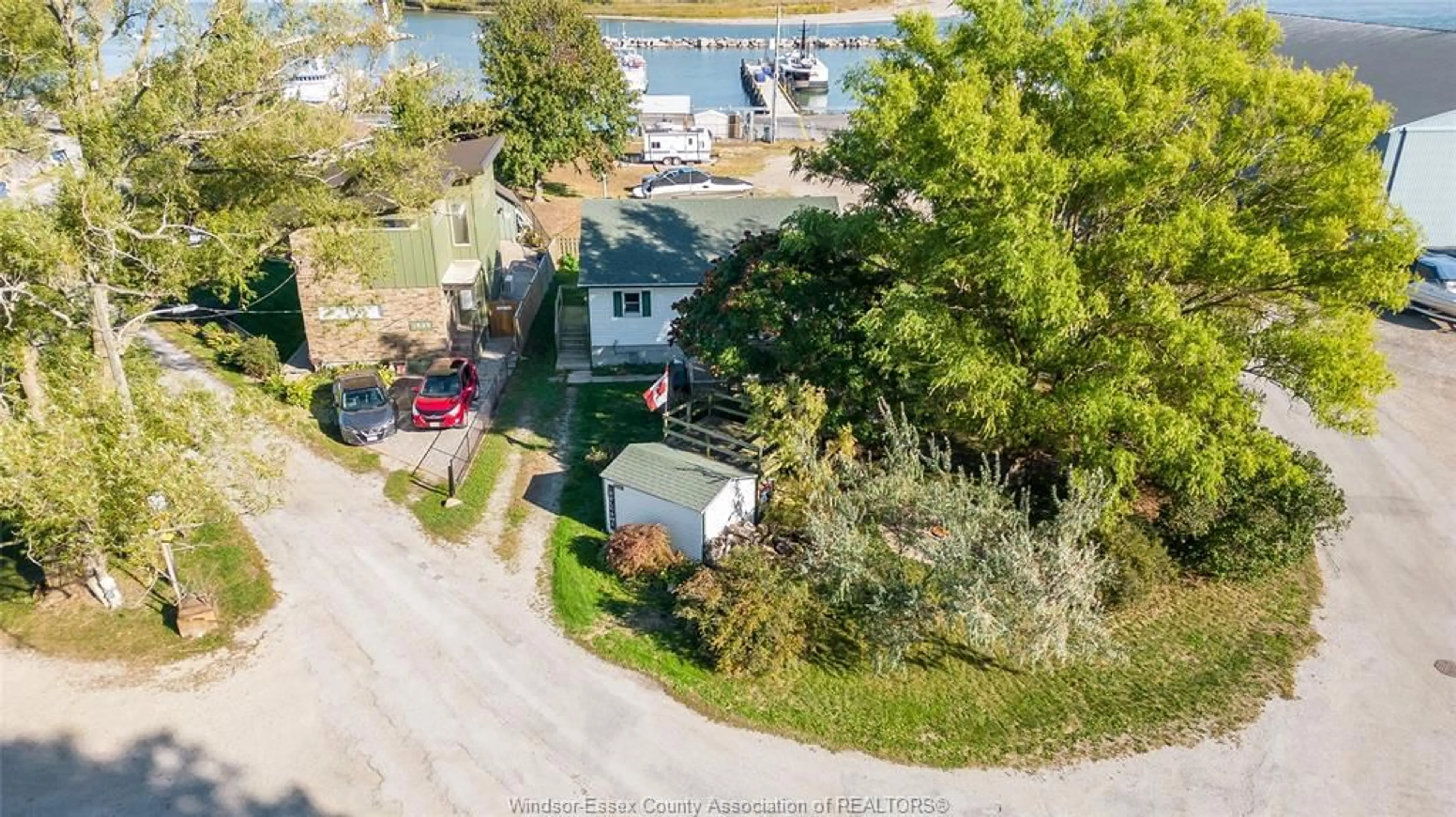 A pic from outside/outdoor area/front of a property/back of a property/a pic from drone, water/lake/river/ocean view for 1520 KERR Ave, Erieau Ontario N0P 1N0