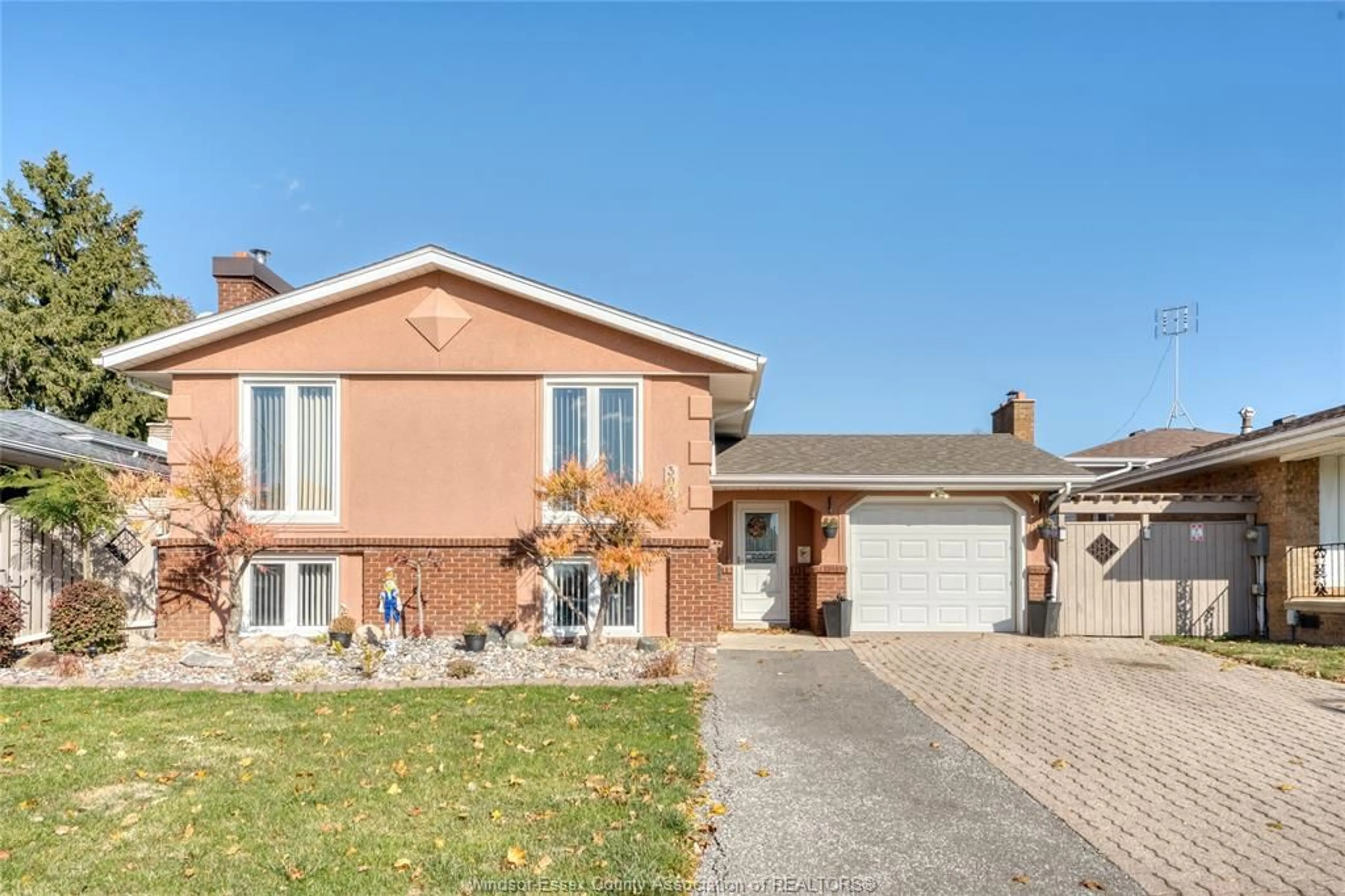 Home with brick exterior material, street for 3036 FOREST GLADE Dr, Windsor Ontario N8R 1L5