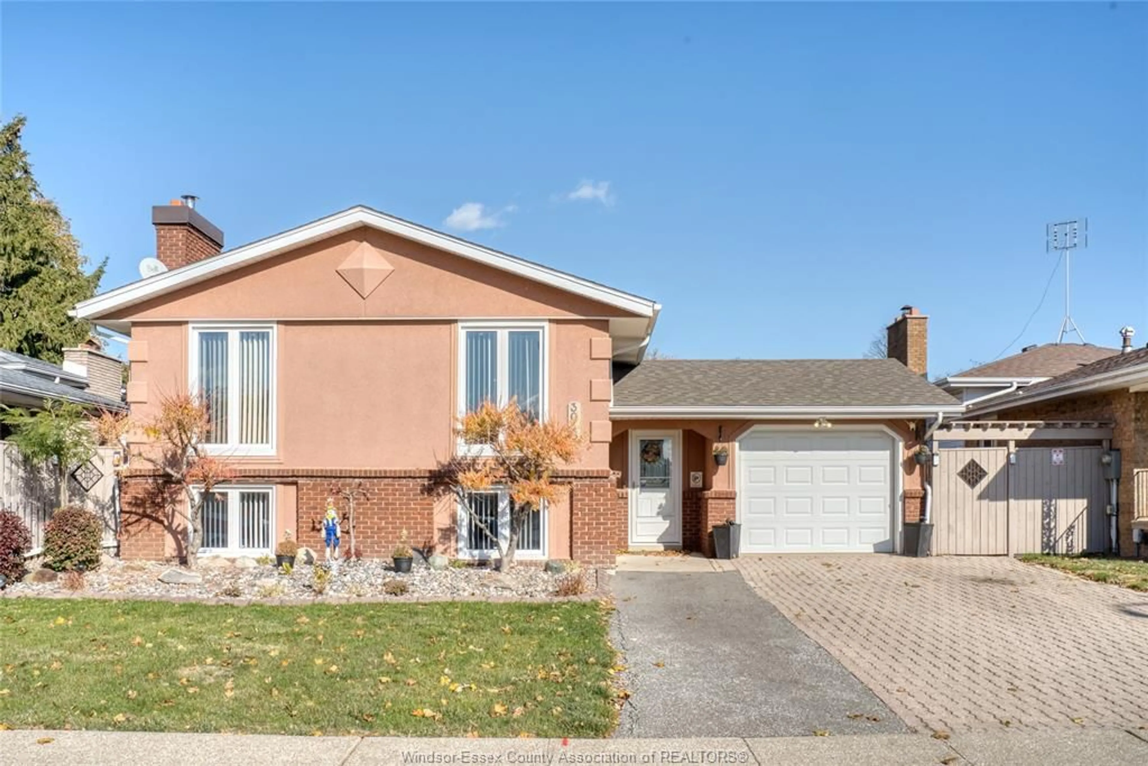 Home with brick exterior material, street for 3036 FOREST GLADE Dr, Windsor Ontario N8R 1L5