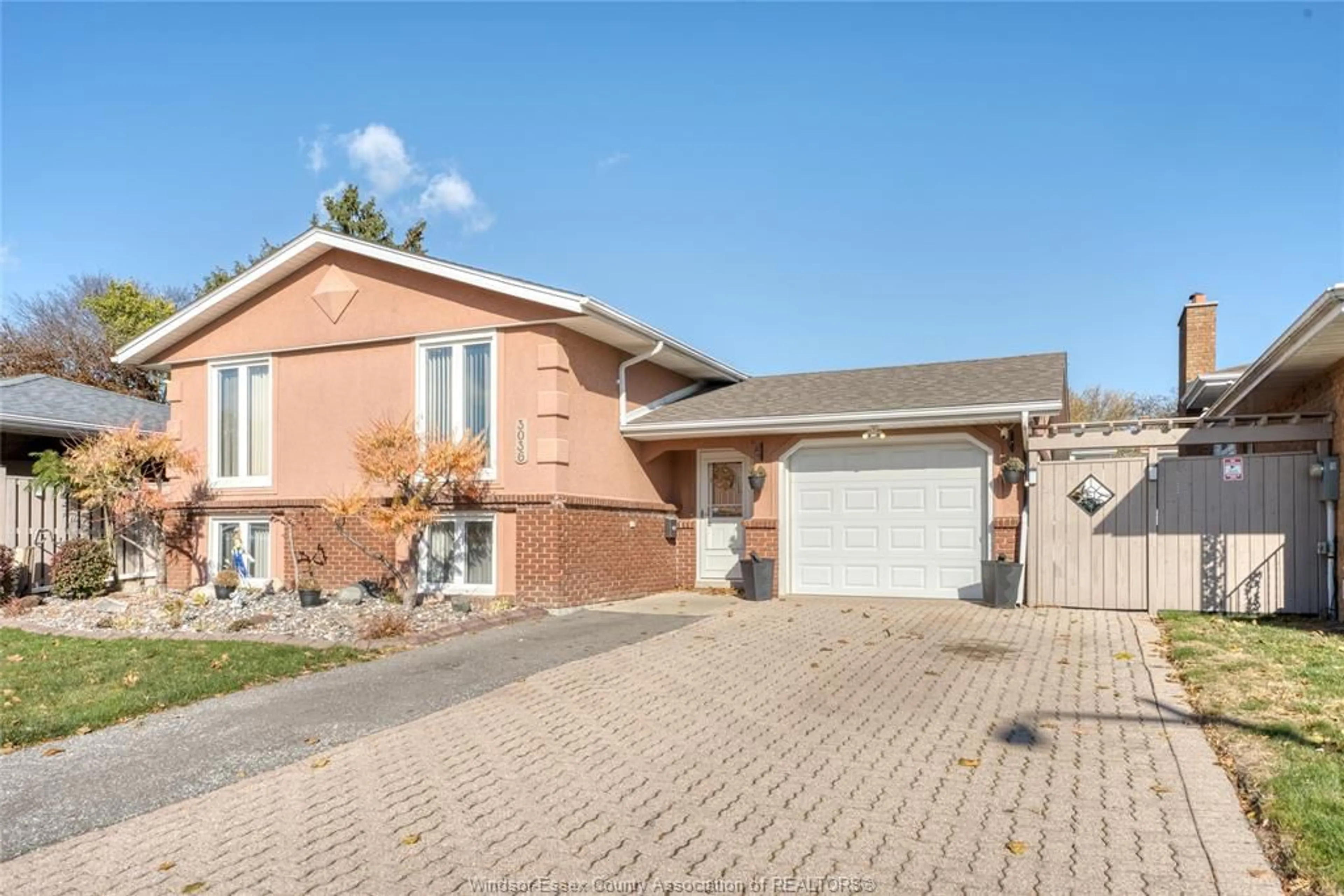 Home with brick exterior material, street for 3036 FOREST GLADE Dr, Windsor Ontario N8R 1L5