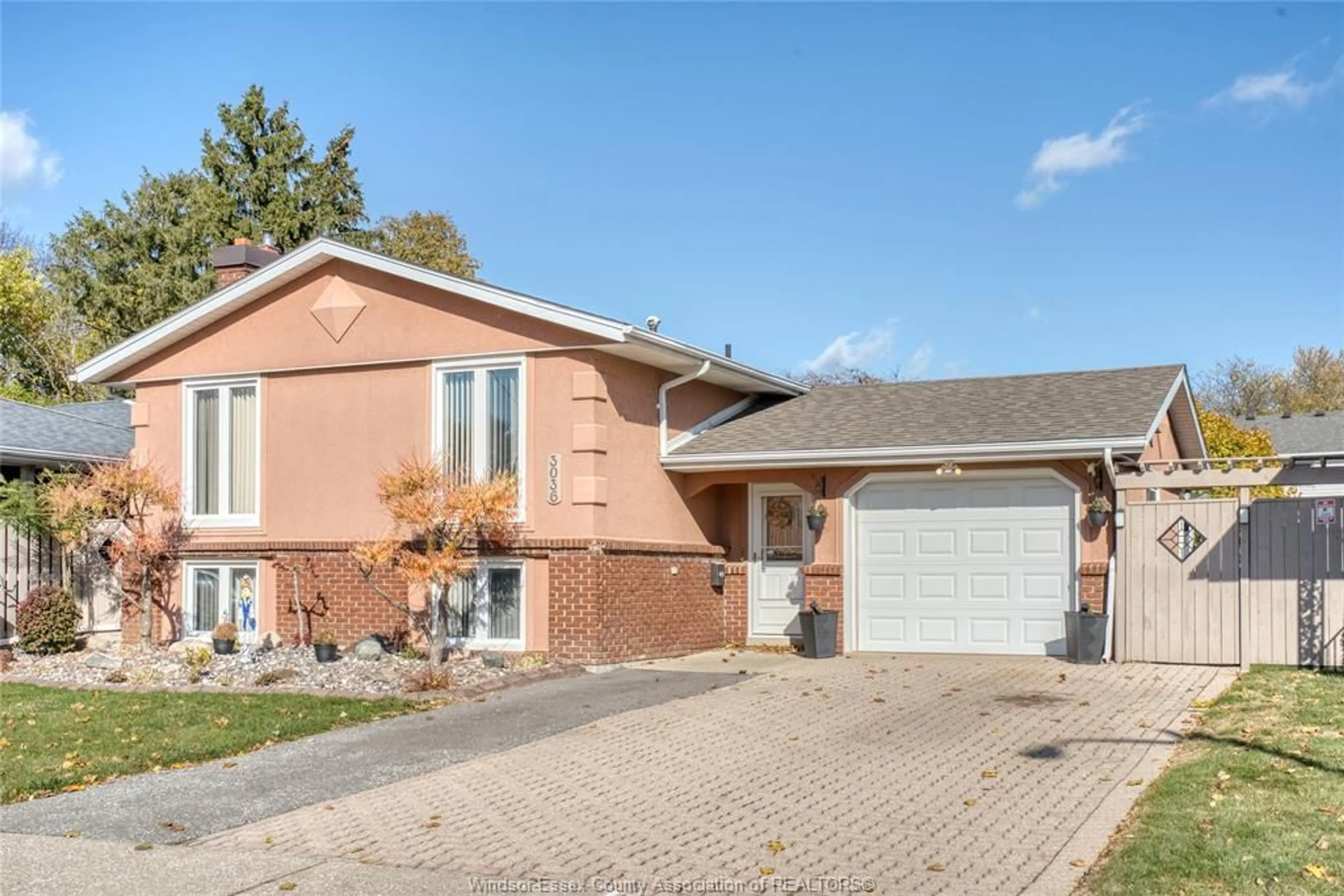 Home with brick exterior material, street for 3036 FOREST GLADE Dr, Windsor Ontario N8R 1L5